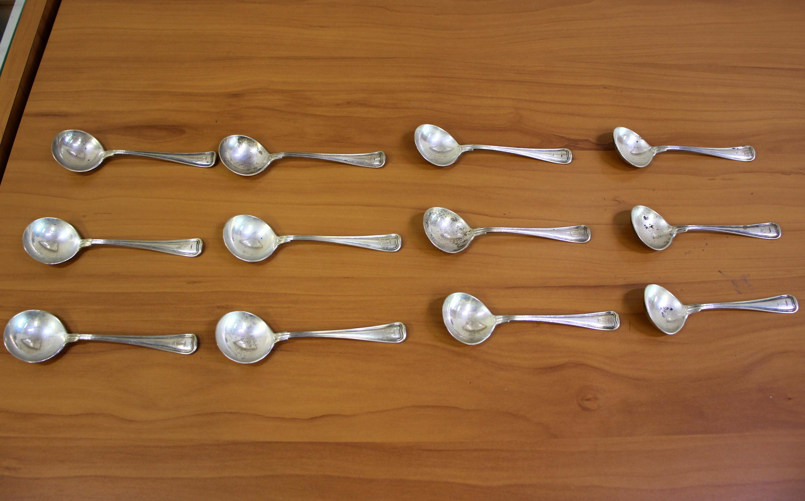 Gorham "Old French" Round Bowl Soup Spoons Set of Twelve in Sterling Silver: .925 sterling silver. 12 round bowl soup bouillon spoons - 5 1/4 Inches long. Marked with lion, anchor, and G for Gorham. Also marked J.E. Caldwell for the retailer that originally sold them. Monogram