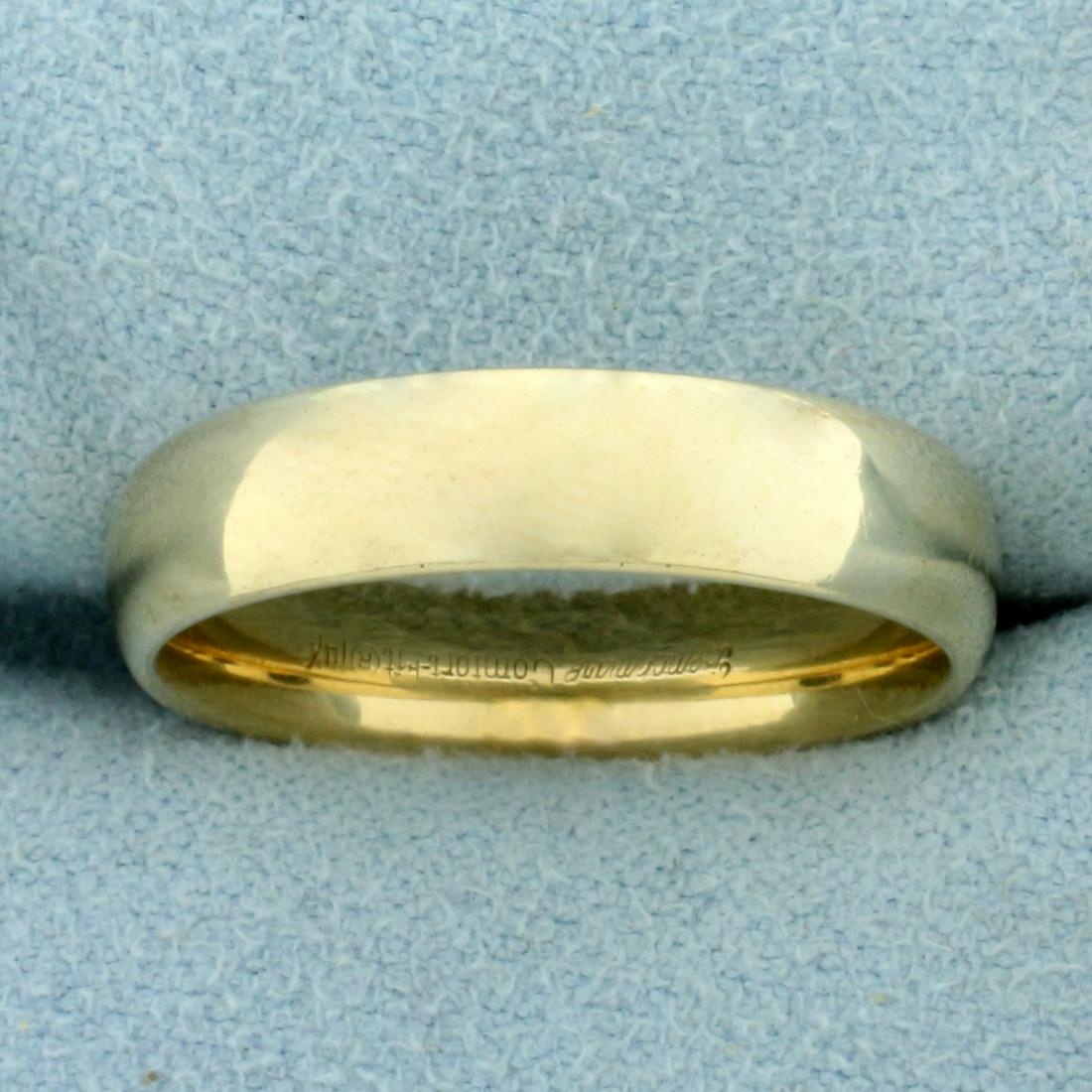 Wedding Band Ring in 14K Yellow Gold: In 14K Yellow Gold. Size 8 1/2. 4.9mm wide. 5.8g