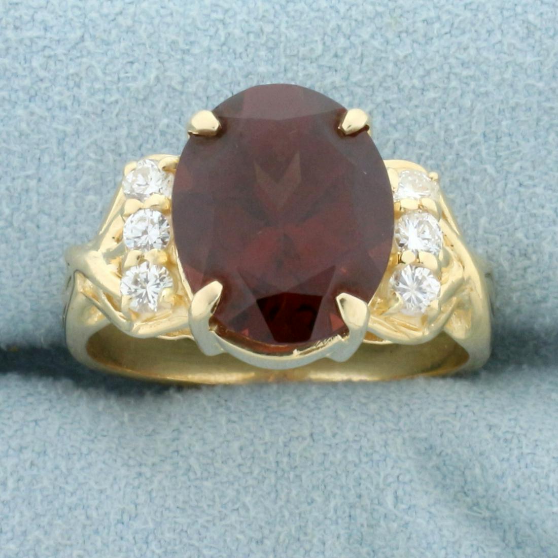 Over 5ct Garnet and Diamond Ring in 14K Yellow Gold: In 14K Yellow Gold. Contains one high quality natural 12x10mm oval cut Garnet gemstone, 5ct, with intense garnet color and excellent clarity. Also contains six high quality .05ct Diamonds, VS clarity/