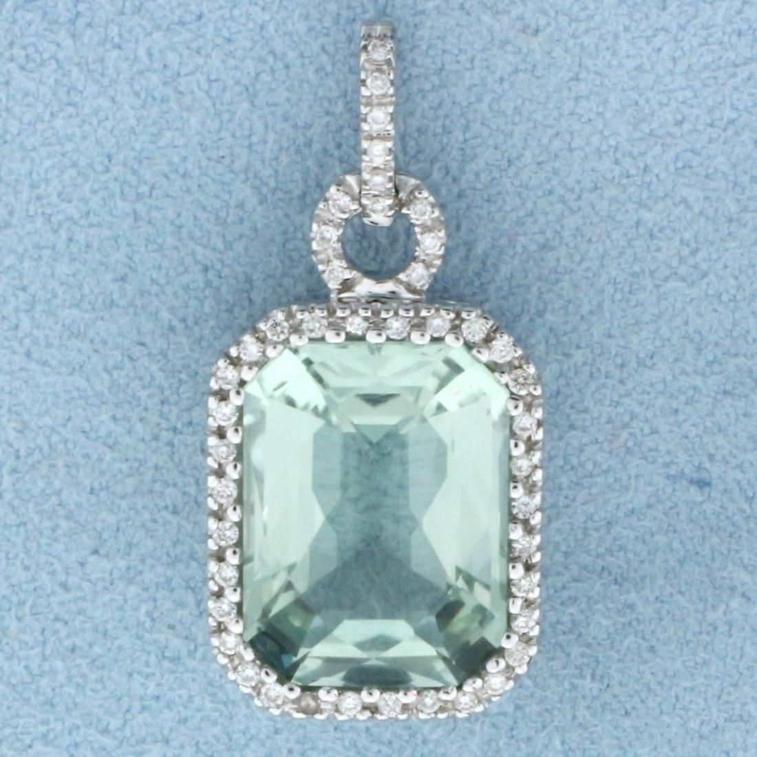 Mint Tourmaline Pendant in 18 White Gold: In 18k white gold. Contains one 14ct high quality natural Tourmaline Gemstone with vibrant mint green color and excellent clarity. Also contains forty four high quality diamonds, 1/2ct TW, SI clarity/
