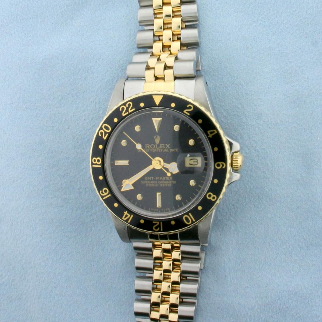 Mens Rolex GMT-Master Rootbeer 40mm 16753: Model 16753, Serial 7541782, Made in 1983. Just cleaned and serviced, runs great. 18k Gold and Steel Jubilee Bracelet, some stretching, indicative of age. 40mm case. No scratching on crystal, virtuall