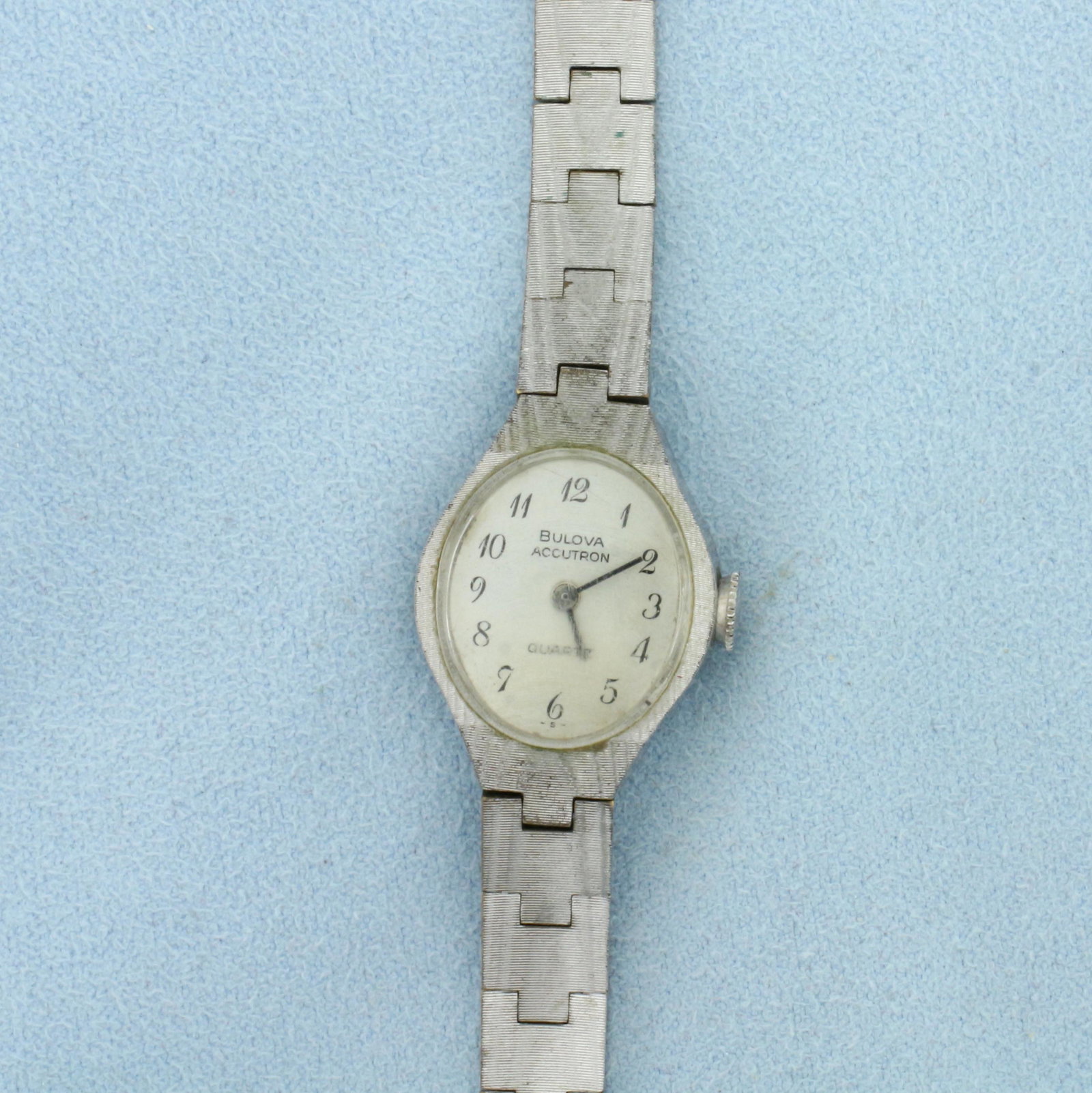 Vintage Ladies Bulova Accutron Watch: Stainless Steel. 6.25 inches long. Quartz movement runs great, new battery. Watch in great condition for its age, some scratching on crystal given its age. 28mmx19mm case.