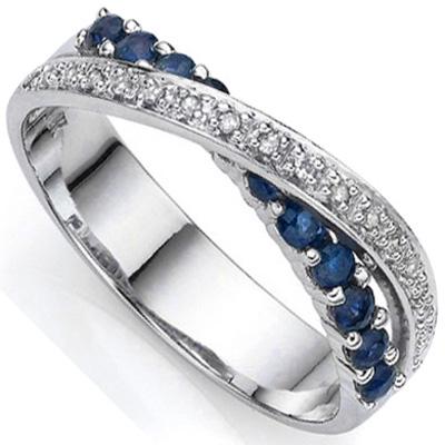Sapphire and Diamond Criss Cross Ring in Sterling Silver: Round cut natural sapphires, 2/3 ctw, with dark blue color are set in a curved line with .01ct genuine diamond accented curved band over the top. Dramatic 3D criss-cross design ring. Size 8. 2.4g