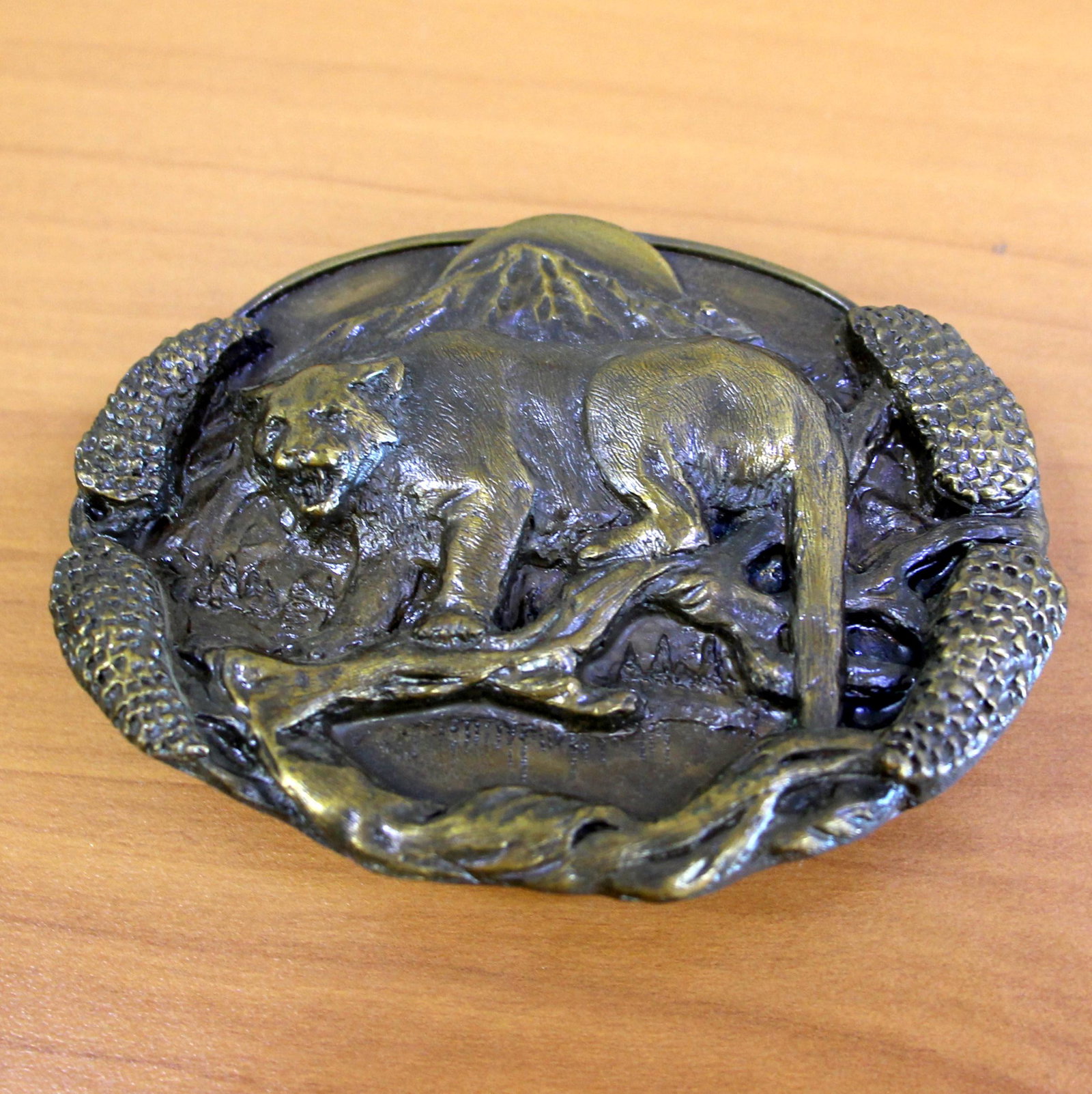 Vintage 1981 Bergamot Brass Co. Mountain Lion Belt Buckle: Bronze patina finish. It is 3 1/4 inches by 2 3/8 inches. 1.75 inch max belt width.