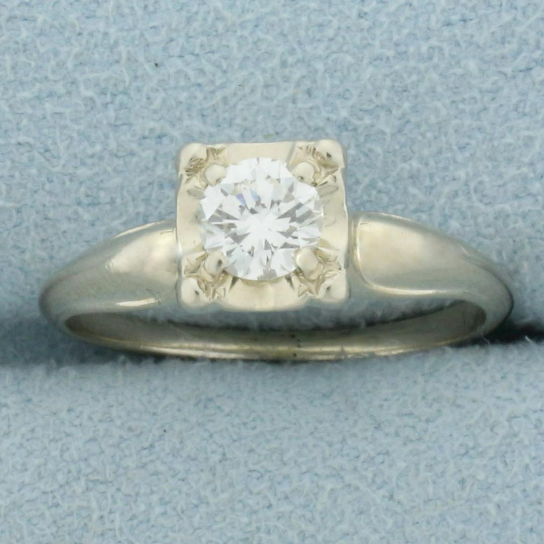 Vintage 1/2ct Diamond Solitaire Engagement Ring in 14K White Gold: In 14K White Gold. Contains a high quality 1/2ct round brilliant cut Diamond, VS clarity/H color. Size 6. 2.7g