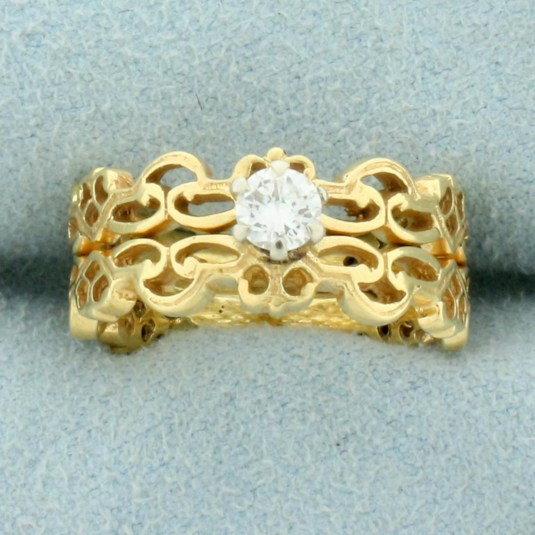 Unique 1/5ct Diamond Solitaire Cut-Out Design Ring in 18K Yellow Gold: In 18K Yellow Gold. Contains one high quality 1/5ct Diamond, VS clarity/H color. Size 5 1/2. 5.5g