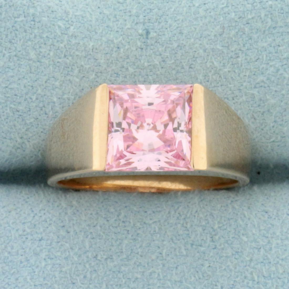 Morganite Solitaire Ring in 14k Rose Gold: In 14k rose gold. Ring contains one high quality 8mm Morganite gemstone with intense salmon color and excellent clarity. Size 7 1/4. 4.8g.
