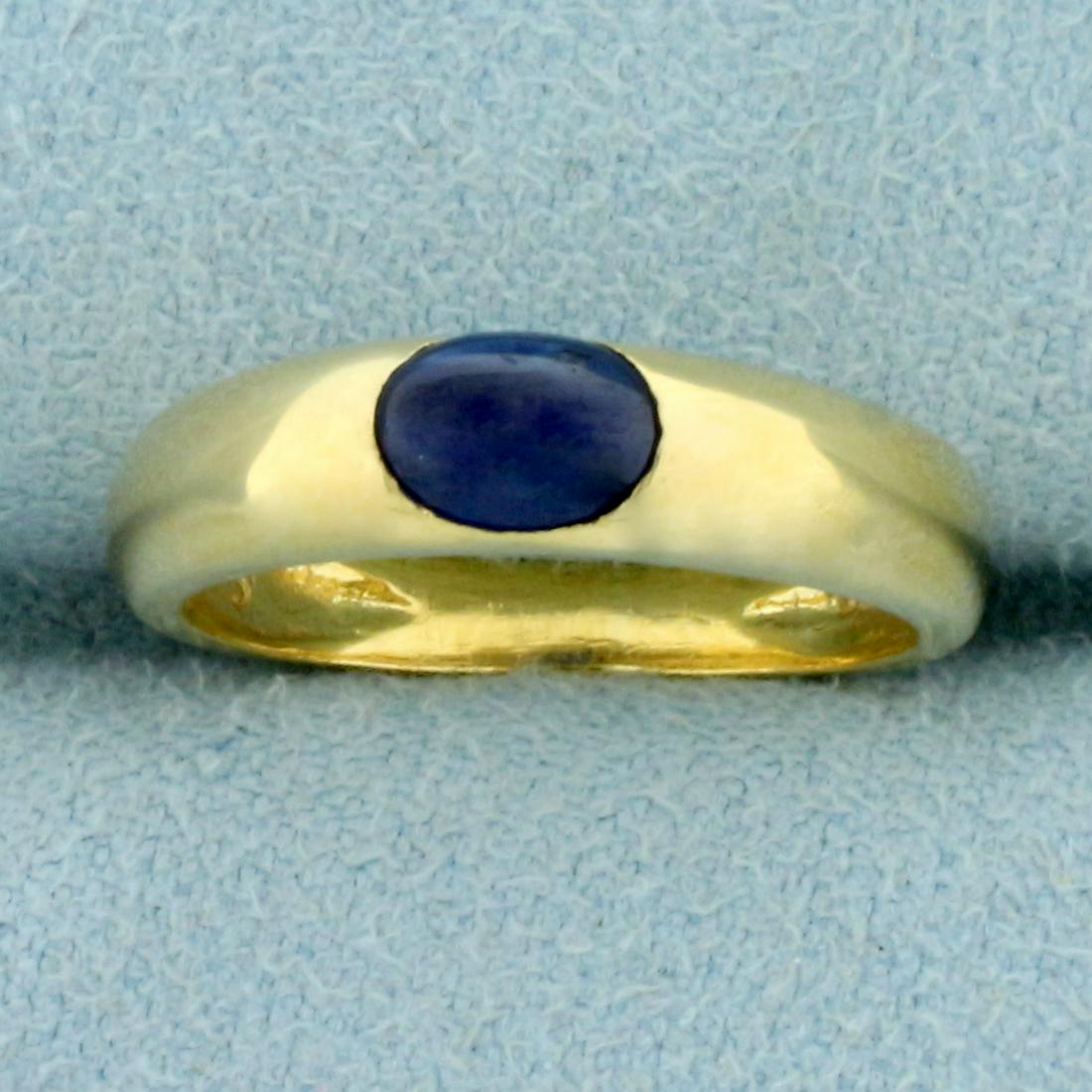 Sapphire Band Ring in 18K Yellow Gold: In 18K Yellow Gold. Contains one high quality natural 6x4mm 1/2ct Sapphire gemstone with intense blue color and excellent clarity. Size 4. 2.8g