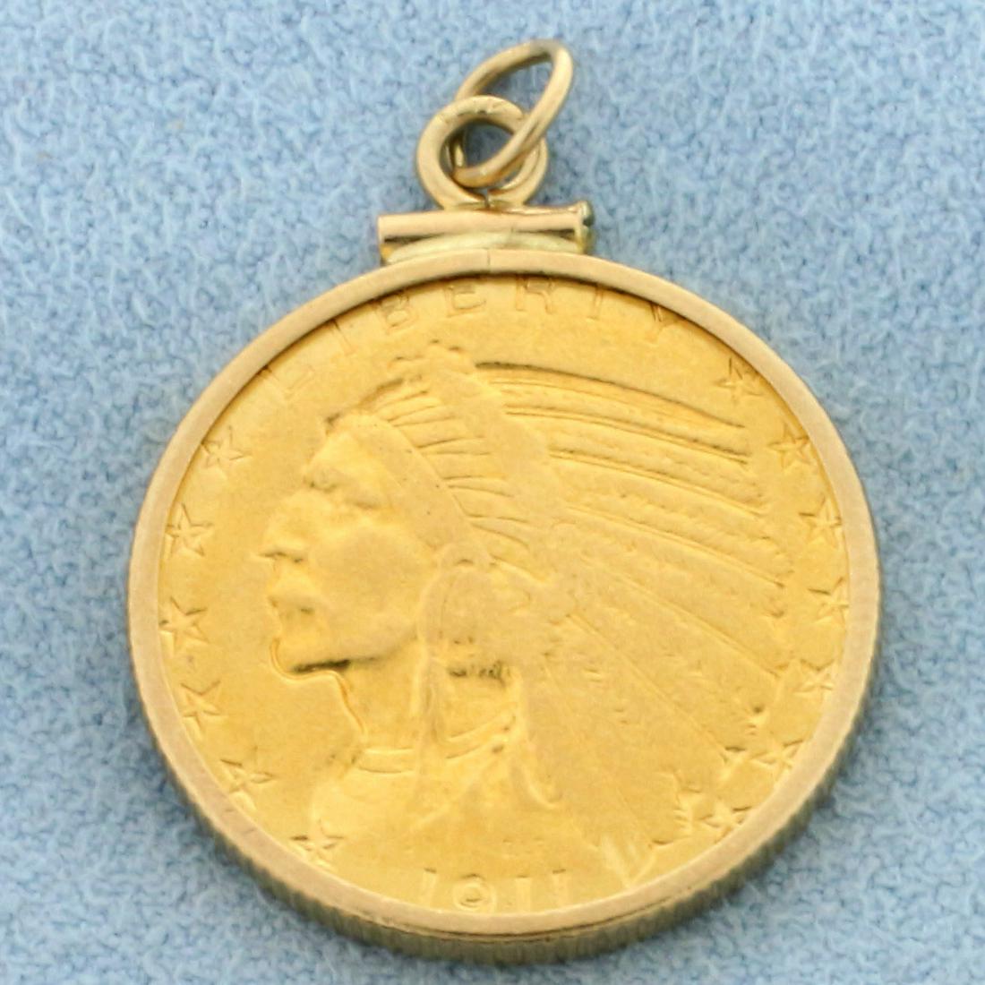 1911 Five Dollar Indian Head Gold Coin Pendant: Bezel in 10k yellow gold. Contains a 1911 $5 Indian Head 90% pure gold coin. Measures1 1/4 inches long. 9.4g.