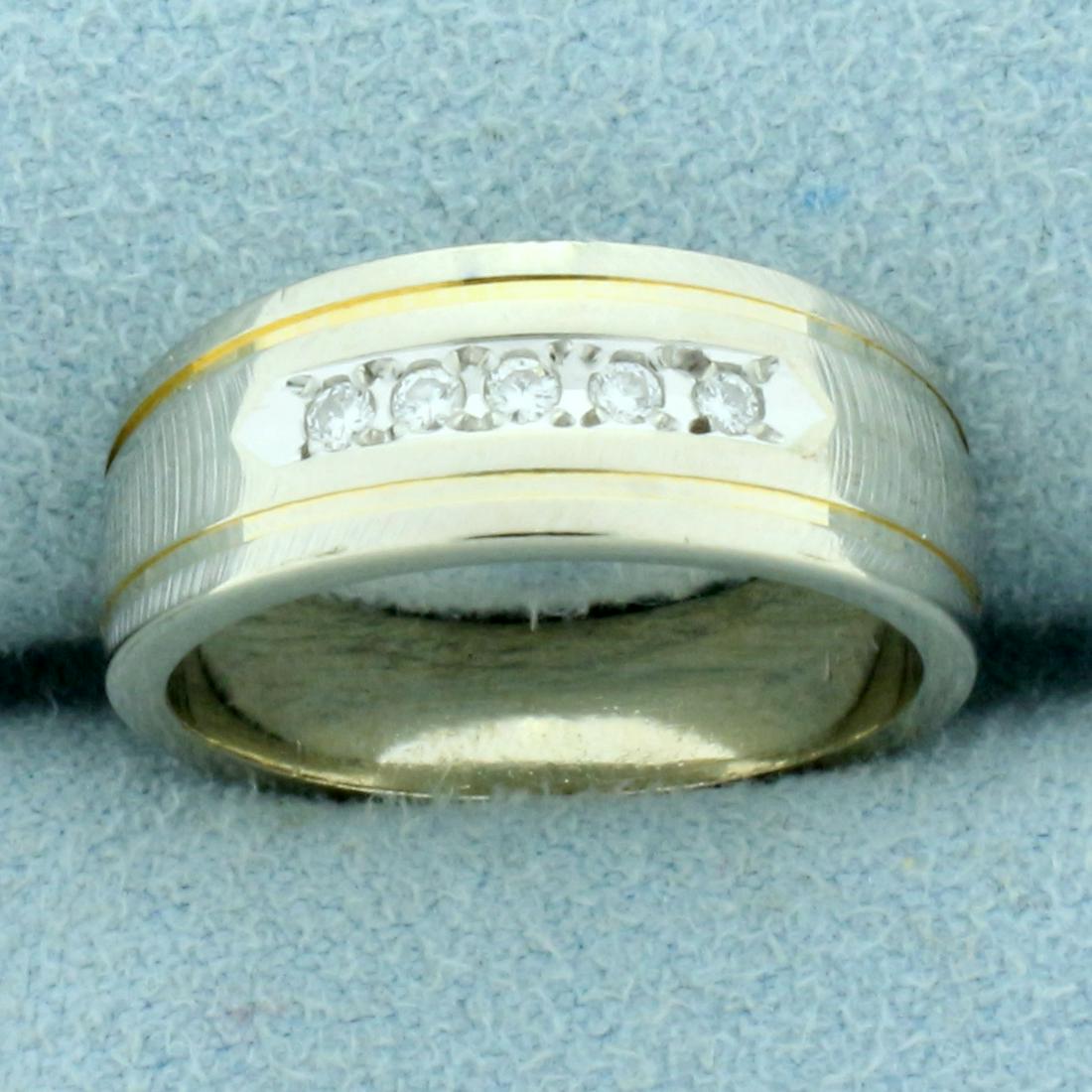 Diamond Wedding Band Ring in 14K White Gold: In 14K White Gold. Contains five high quality .01ct Diamonds, VS clarity/G color. Size 4 1/2. 4.7g.