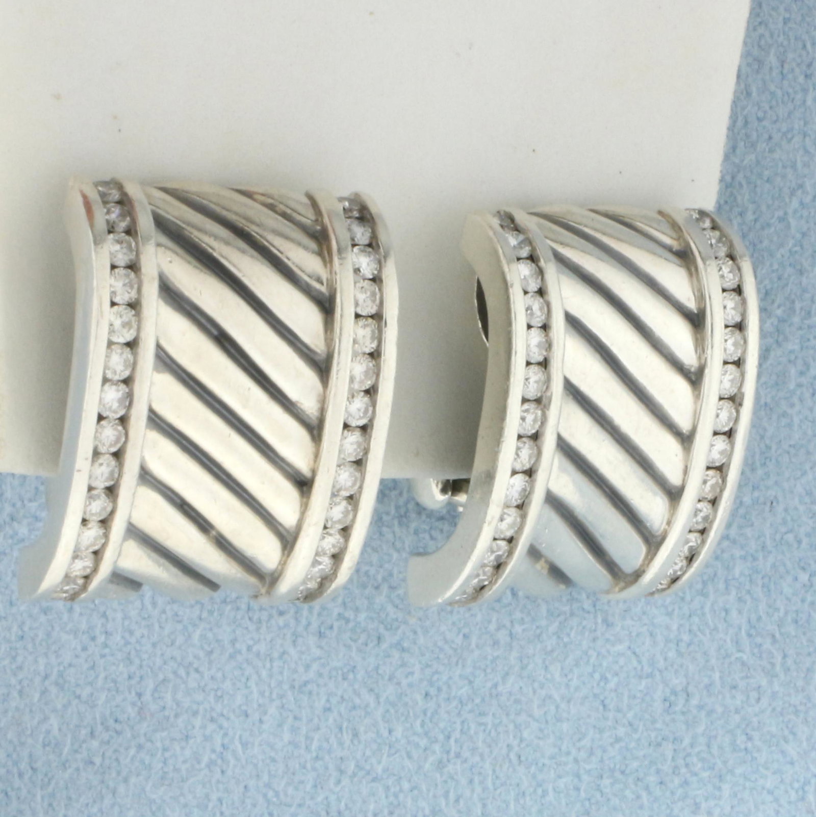 David Yurman Diamond Thoroughbred Cigar Band Cable Earrings in .925 Sterling Silver: In .925 sterling silver. Guaranteed Authentic. Contains approx. 1.1 carat total weight of high quality diamonds, G-H color/VS clarity. Omega Backs for added comfort. 15.3g.