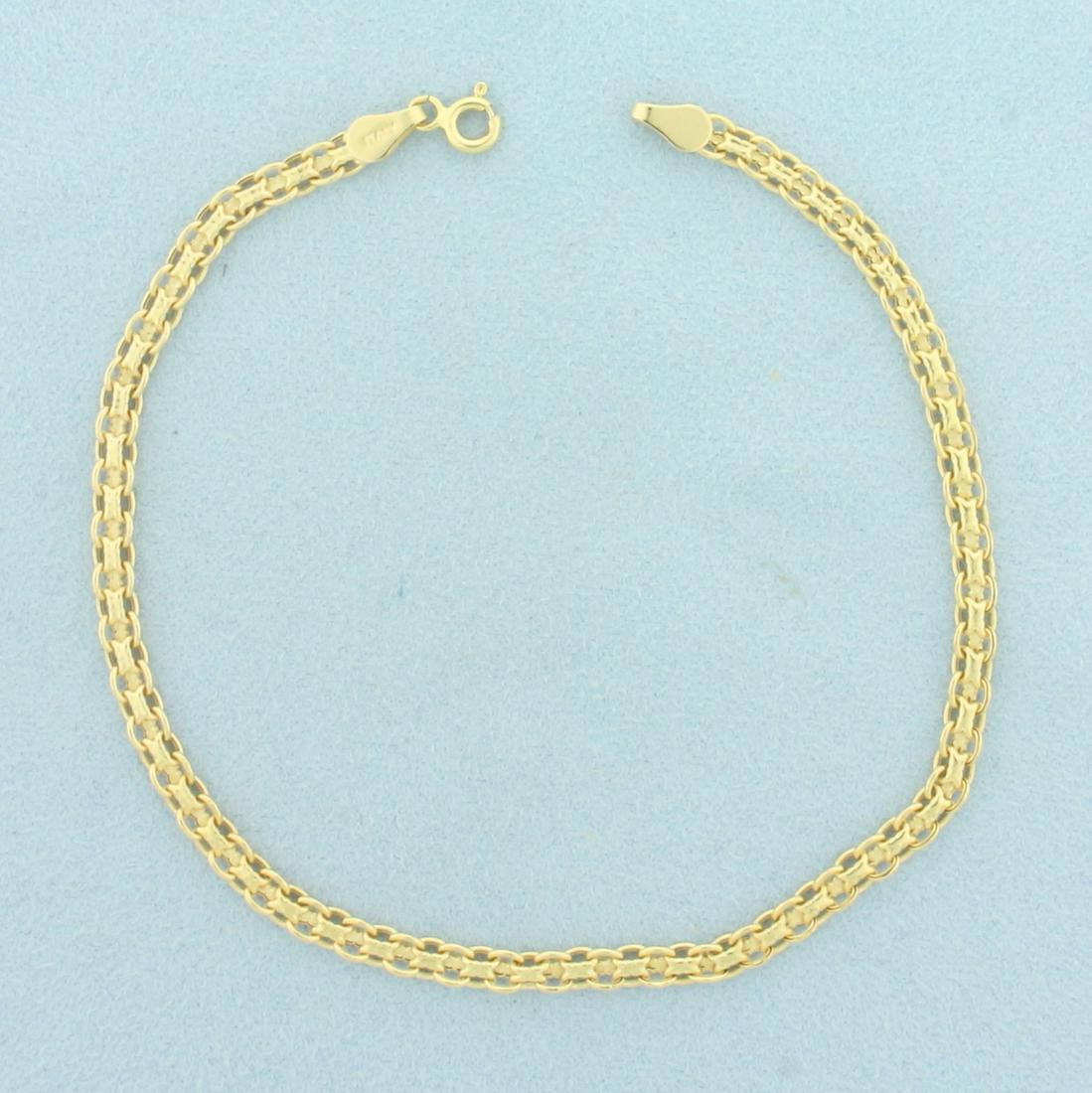Italian Bismark Link Chain Anklet in 14k Yellow Gold: In 14k yellow gold. 9 inches long, 3.75mm wide. Spring clasp. 2.6g.