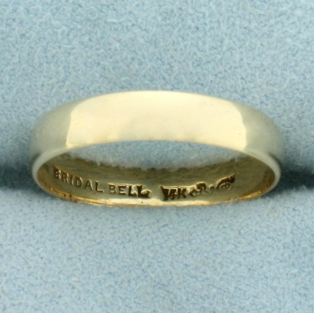 Wedding Band Ring in 14K Yellow Gold: In 14K Yellow Gold. Size 9, 4mm wide. 2.4g.