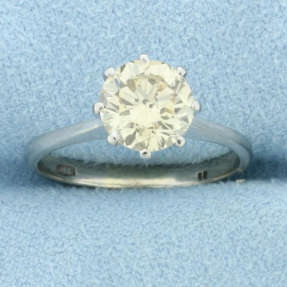 1 3/4ct Solitaire Champagne Diamond Engagement Ring in 14K White Gold: In 14K White Gold. Contains one high quality natural 1.75ct round brilliant Champagne Diamond with warm color and is eye clean. Size 7. 3.1g.