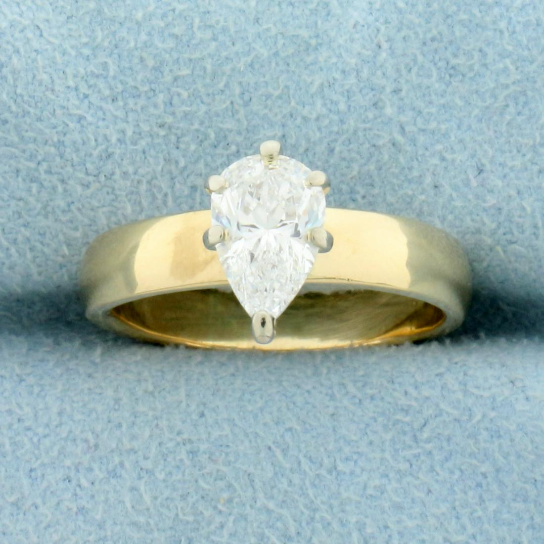 Over 1ct Pear Cut Diamond Solitaire Engagement Ring in 14K Yellow Gold: In 14K Yellow Gold. Contains a high quality 1 1/8ct pear cut Diamond, VS clarity/I color with great cut for lots of sparkle and no bowtie effect. Size 6 1/2. 4.8g