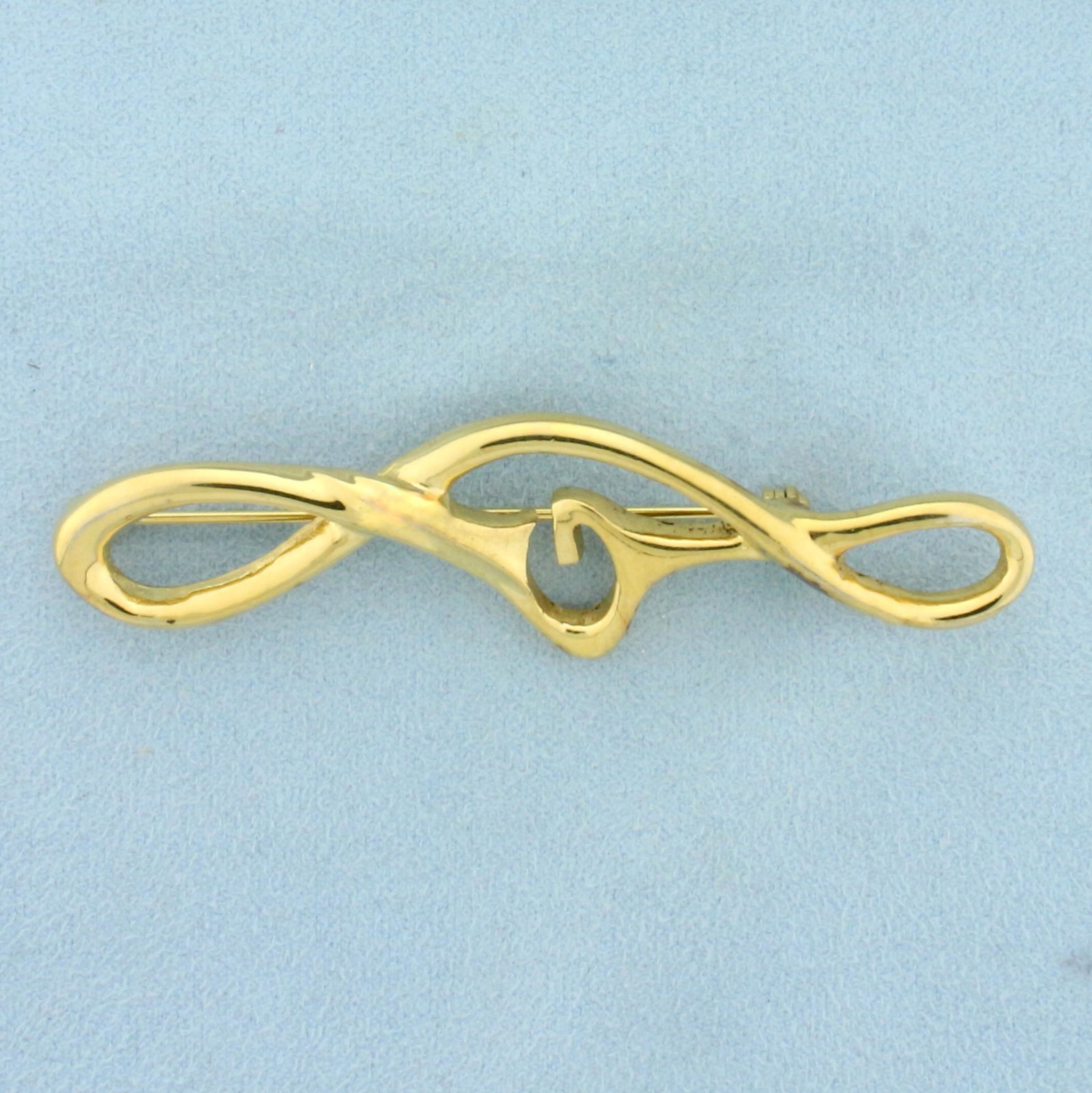 Vintage Designer Signed Givenchy G Logo Twist Brooch Pin: Gold Plated. 3 inches x 3/4 inches. Iconic Givenchy 4G logo in twist design. Signed on back. Rare Find! 9.5g.