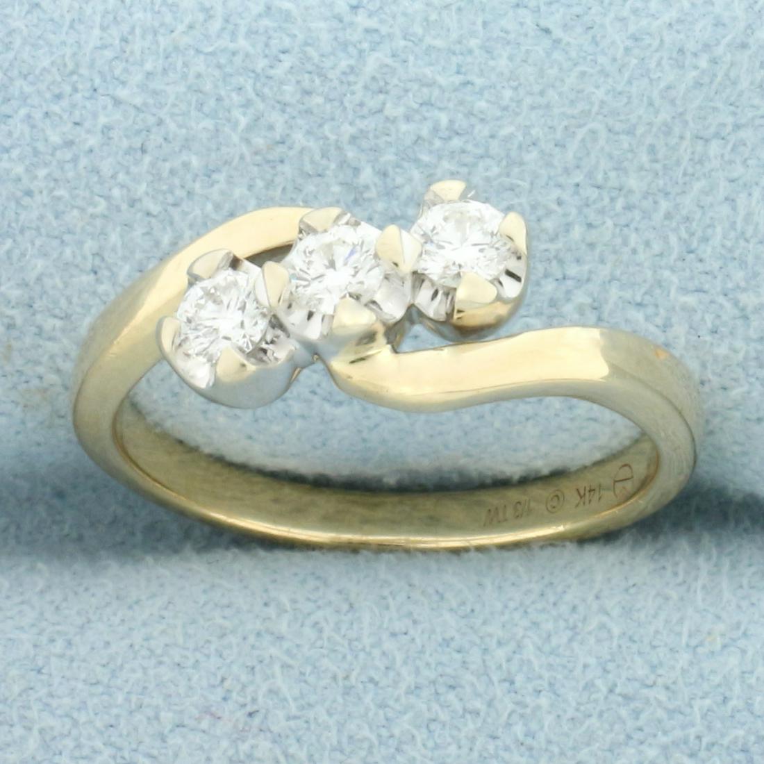 3 Stone Diamond Wedding or Anniversary Ring in 14K Yellow Gold: In 14K Yellow Gold. Contains three high quality .1ct Diamonds, SI1 clarity/I color, great cut for lots of sparkle. Size 7. 3.9g