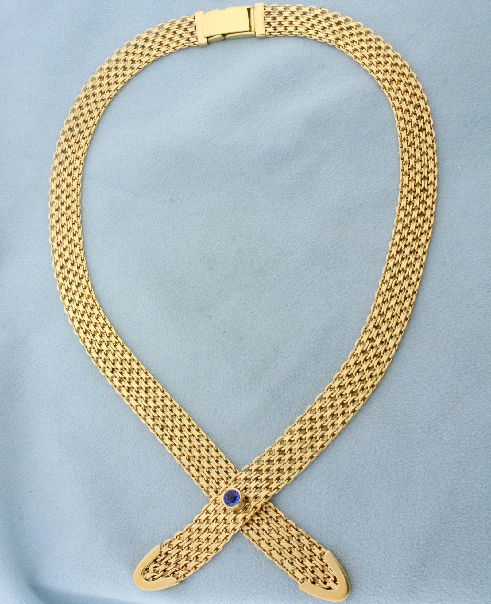 Heavy Bismarck Link Tanzanite Necklace in 14K Yellow Gold: In 14K Yellow Gold. Contains one high quality natural 4mm round cut Tanzanite gemstone with intense blue purple color and excellent clarity. 18 inches long. 11.5mm wide. 58.0g