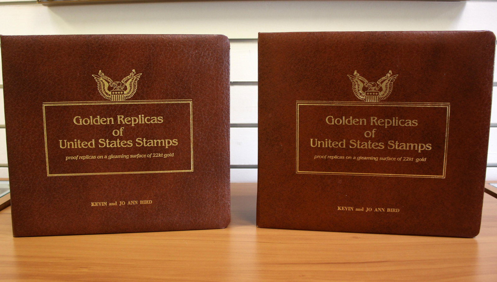 Set of 75 22k Gold Plated Replicas of United States Stamps: Set of 2 Binders with a total of 75 Stamps. 22k Gold plated US commemorative replica stamps from the Postal Commemorative Society. Stamps are form 1981-1984.