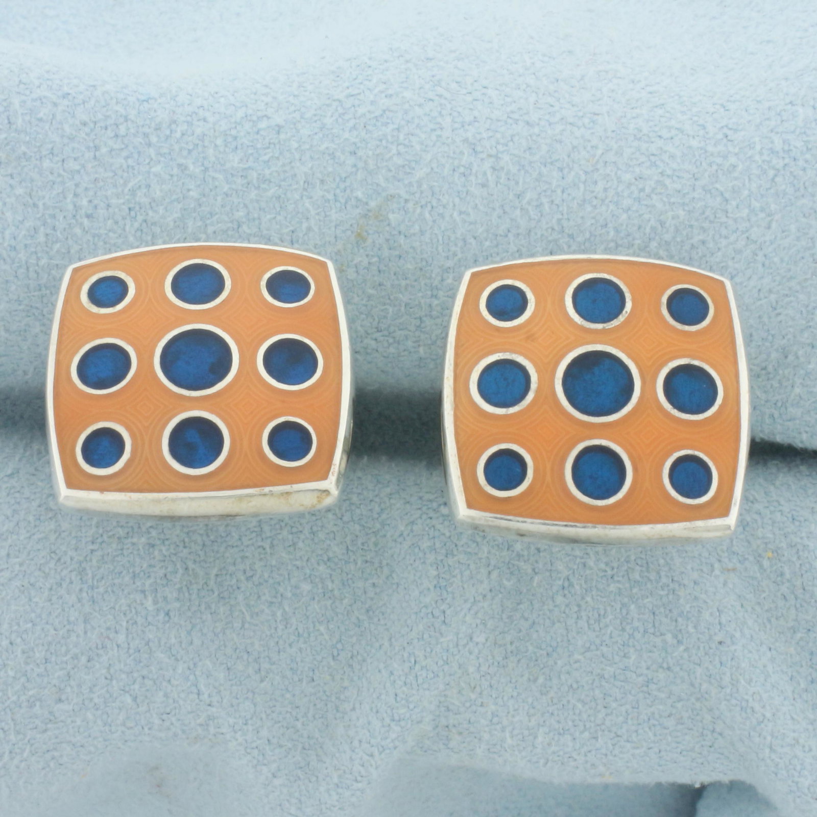 Vintage Early Charles Tyrwhitt Blue and Orange Enamel Sterling Silver Cufflinks: In .925 sterling silver. Blue and Orange enamel inlay. 5/8 inches long by 5/8 inches wide. 23.0g.