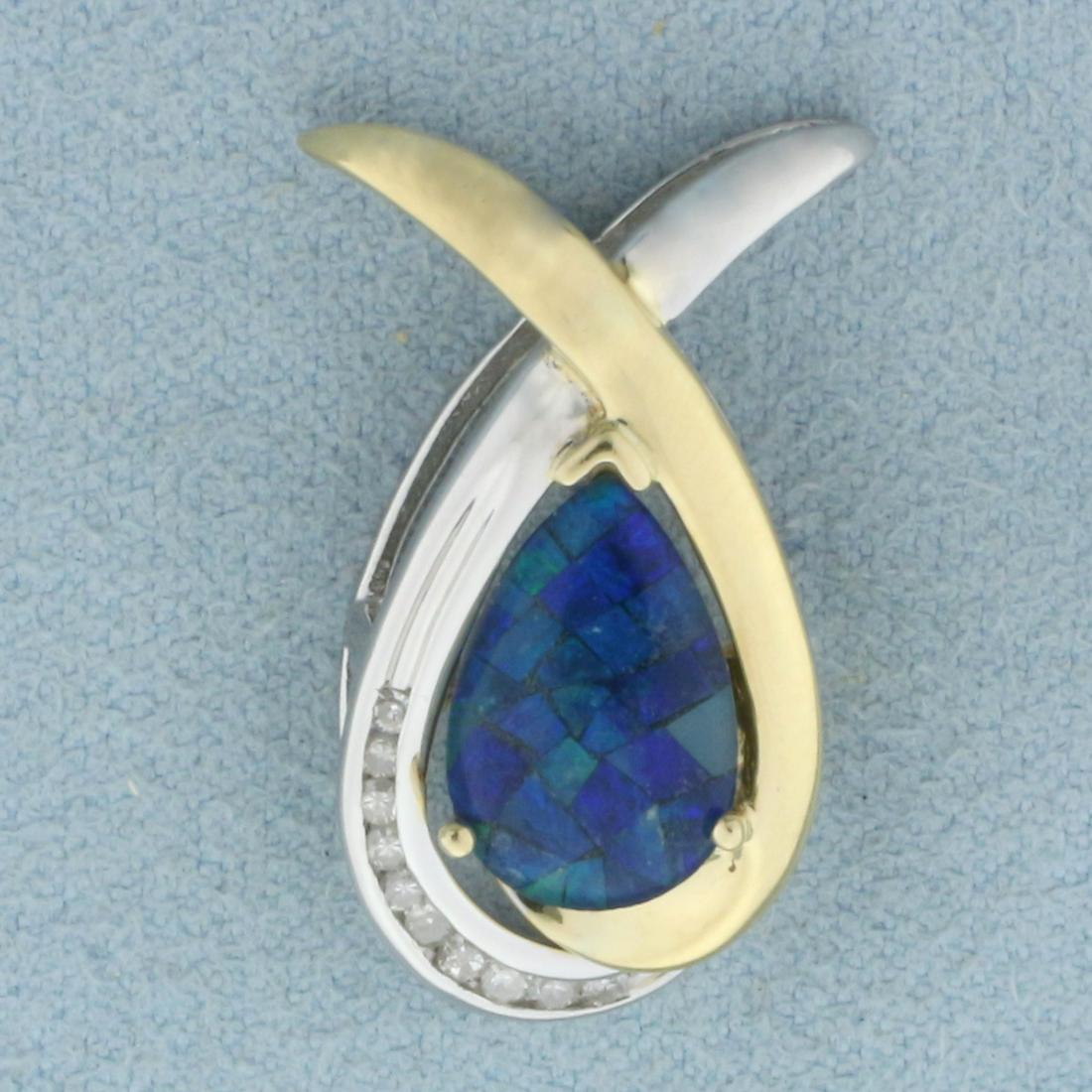 Opal and Diamond Two Tone Teardrop Pendant in 14k Yellow and White Gold: In 14k yellow and white gold. Contains one teardrop shaped Black Opal Triplet, 12mm by 7.85mm, with beautiful blue and green color. Also contains ten .01ct high quality diamonds, SI clarity/H color. C