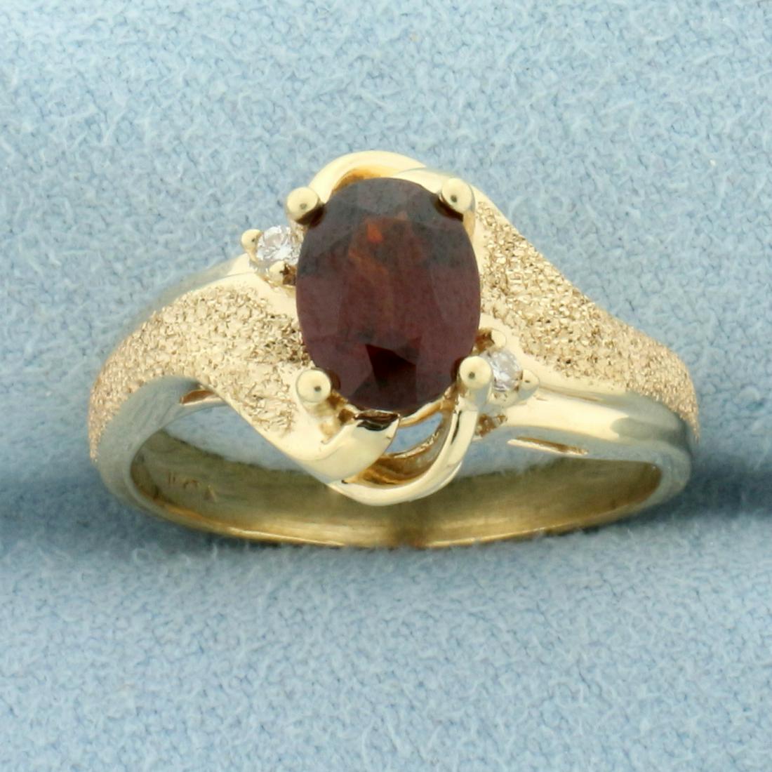 Vintage Garnet Ring in 10k Yellow Gold: In 10k yellow gold. Contains a high quality natural 1.25ct Garnet gemstone with intense color and excellent clarity. Size 8 1/2. 4.7g.