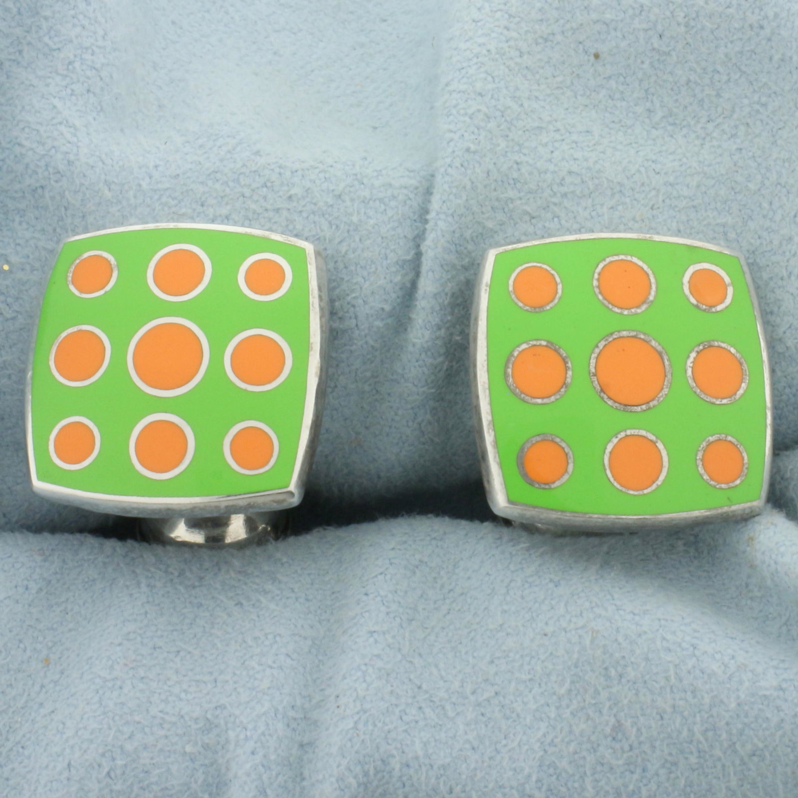 Vintage Early Charles Tyrwhitt Green and Orange Enamel Sterling Silver Cufflinks: In .925 sterling silver. Green and Orange enamel inlay. 5/8 inches long by 5/8 inches wide. 22.9g.