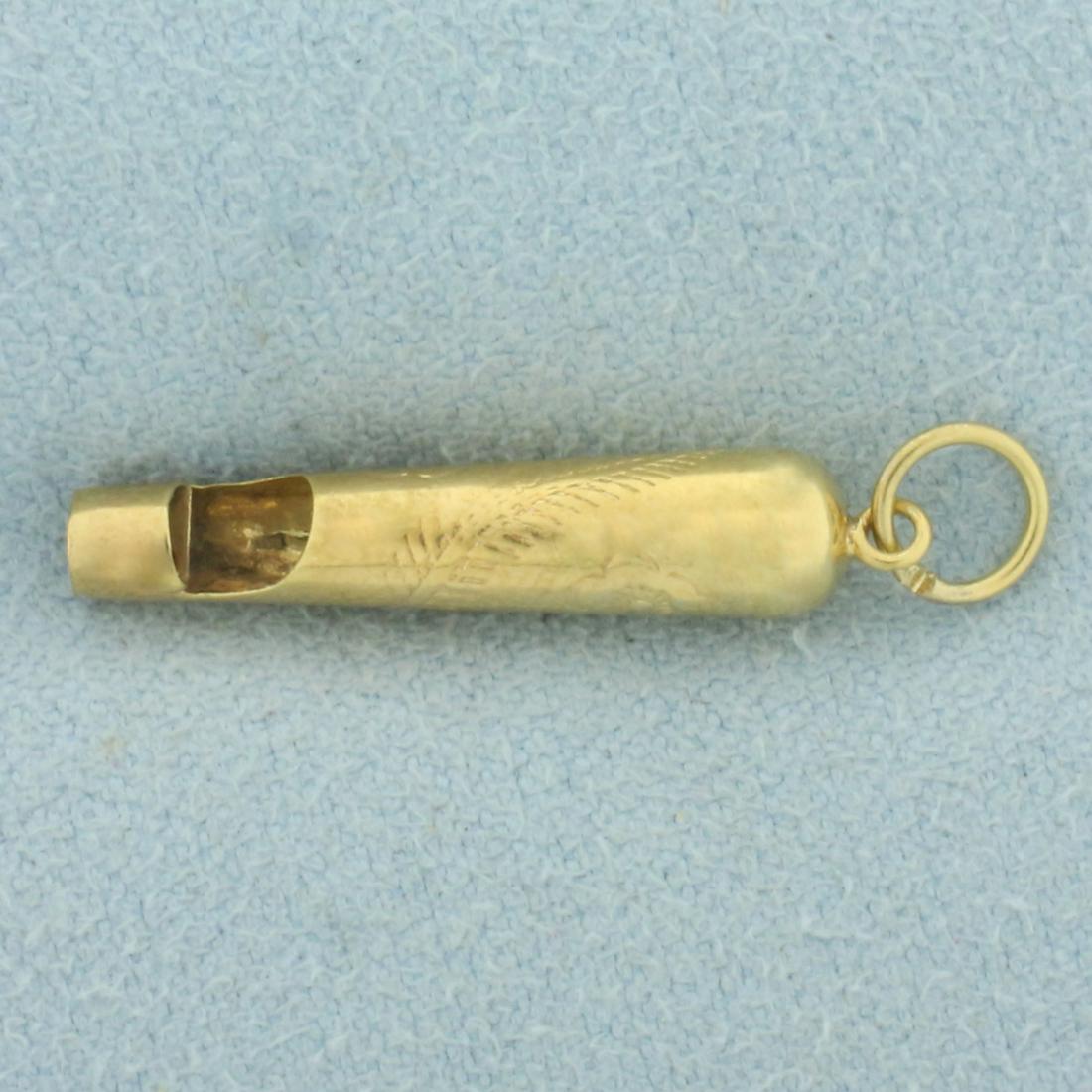 Vintage Engraved Whistle Charm in 14k Yellow Gold: In 14k yellow gold. Really works. Intricate flower engraving. 3D design. 1 inch long, 1/8 inch wide. 1.0g.