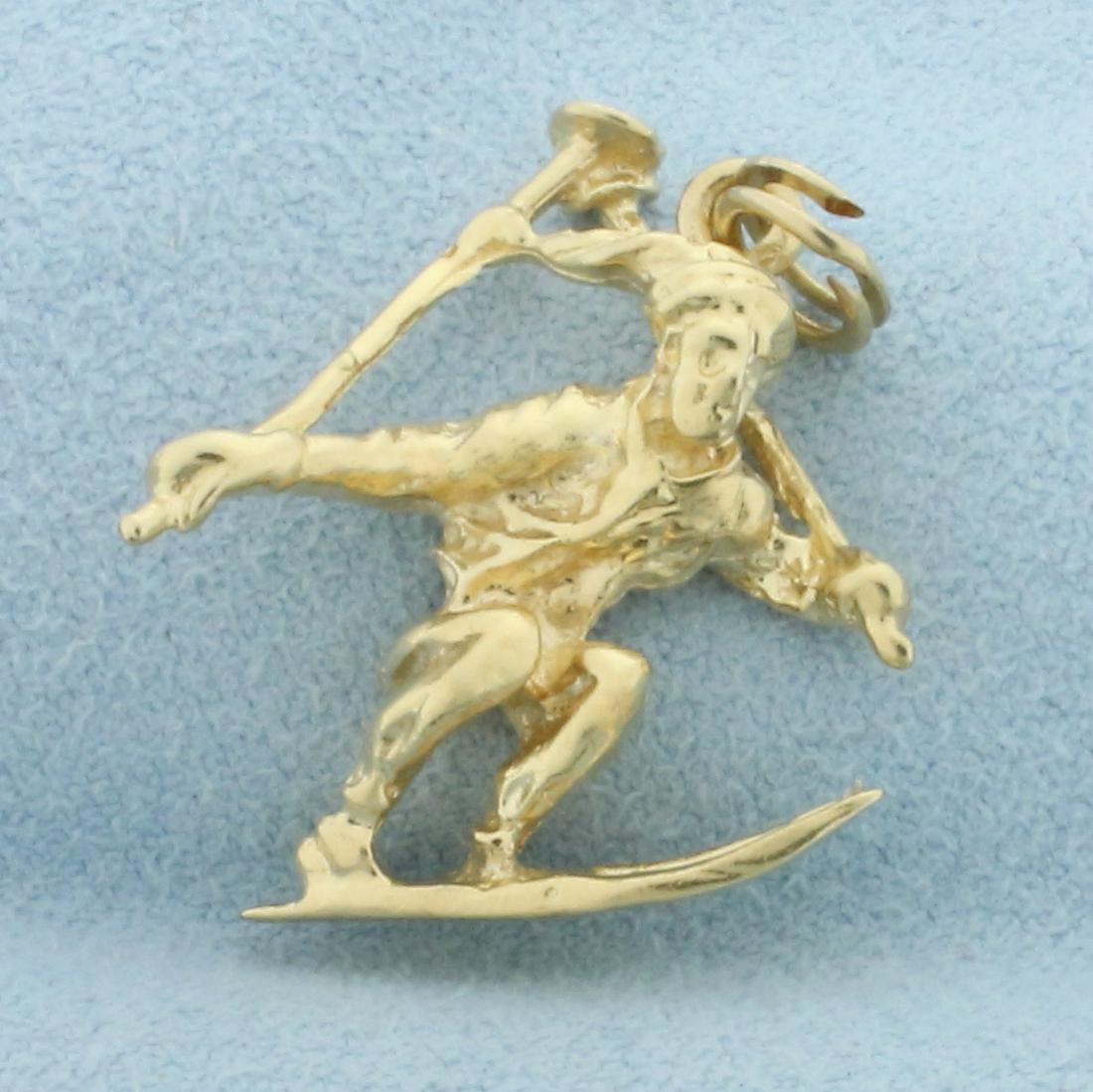Vintage 3D Snow Skier Pendant or Charm in 14k Yellow Gold: 14k yellow gold. 1 1/8 Inch long (including jump ring) by 7/8 Inch wide. Detailed 3D design. Solid, not hollow. 5.0g.