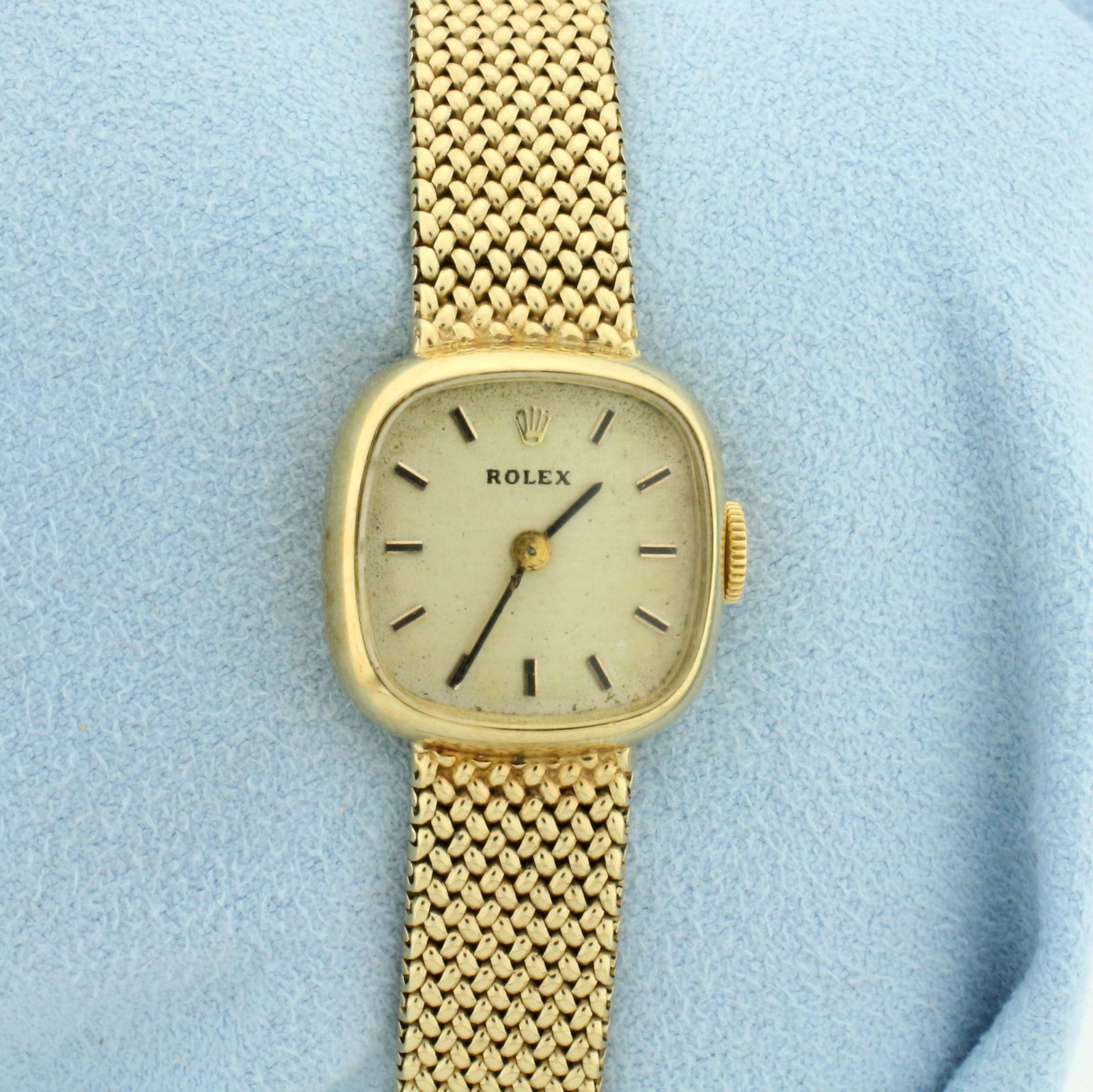 Vintage Womans Rolex Windup Watch in 14k Yellow Gold: Case and Bracelet in solid 14k Yellow Gold. Windup movement runs great. 17mm case. 7.5 inches long. Great condition for its age. 34.1g.