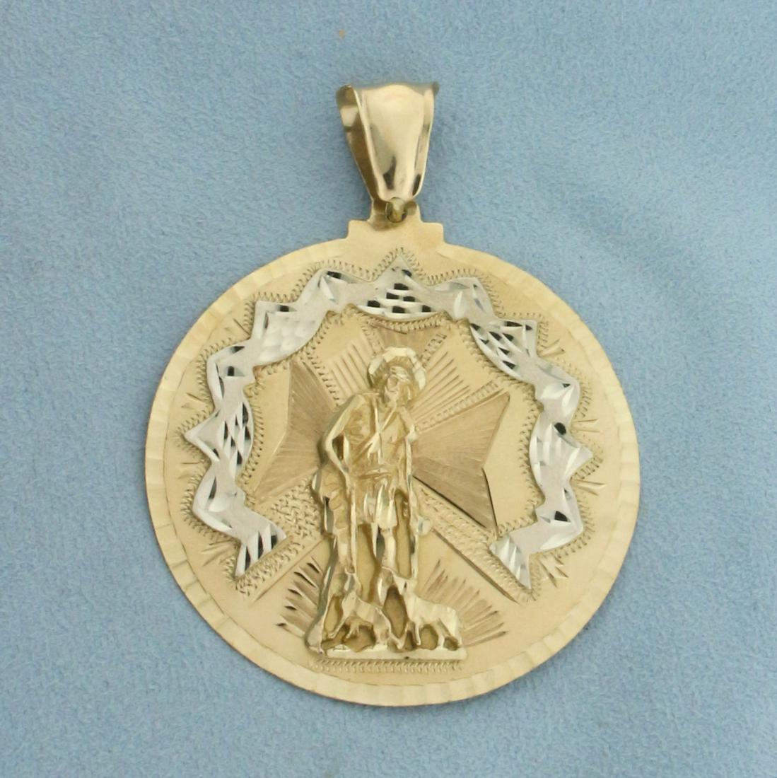 Large Saint Lazarus Pendant in 10k Yellow Gold: In 10k yellow gold. 2 5/8 inches long, 2 inches wide. 15.1g.