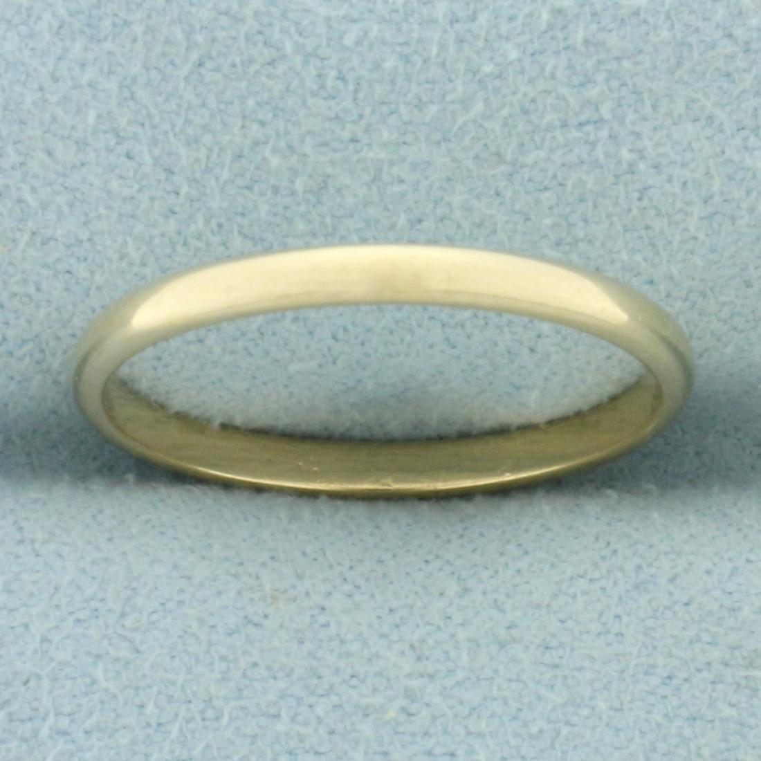 Thin Wedding Band Ring in 14k Yellow Gold: In 14k yellow gold. 2mm wide. Size: 8. 1.6g.