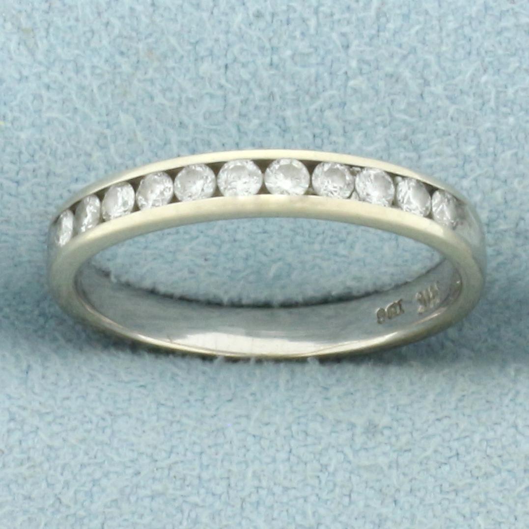 Diamond Wedding Band Ring in 14k White Gold: In 14k white gold. Contains 11 diamonds, 1/4ct TW. I clarity/H color. Size: 4.75. 1.7g.