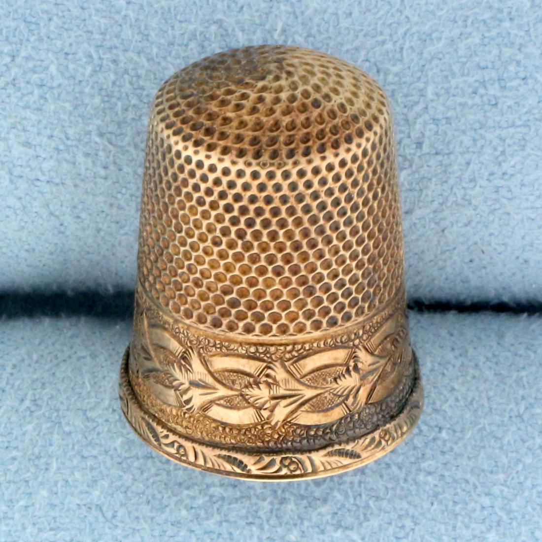 Antique Victorian Thimble in 10k Rose Gold: In 10k rose gold. Original hand engraved monogram. In excellent condition for age, with small hole when used as a charm/pendant. 7/8 inch long. 5/8 inch diameter. 3.1g.