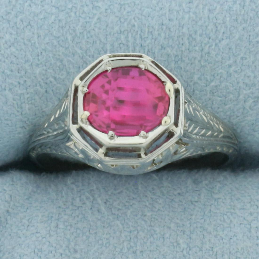 Antique Art Deco Pink Sapphire Filigree Ring in 18k White Gold: In 18k white gold. Contains one high quality 1ct pink sapphire gemstone with vibrant color and excellent clarity. Size 6.75. 4.6g.
