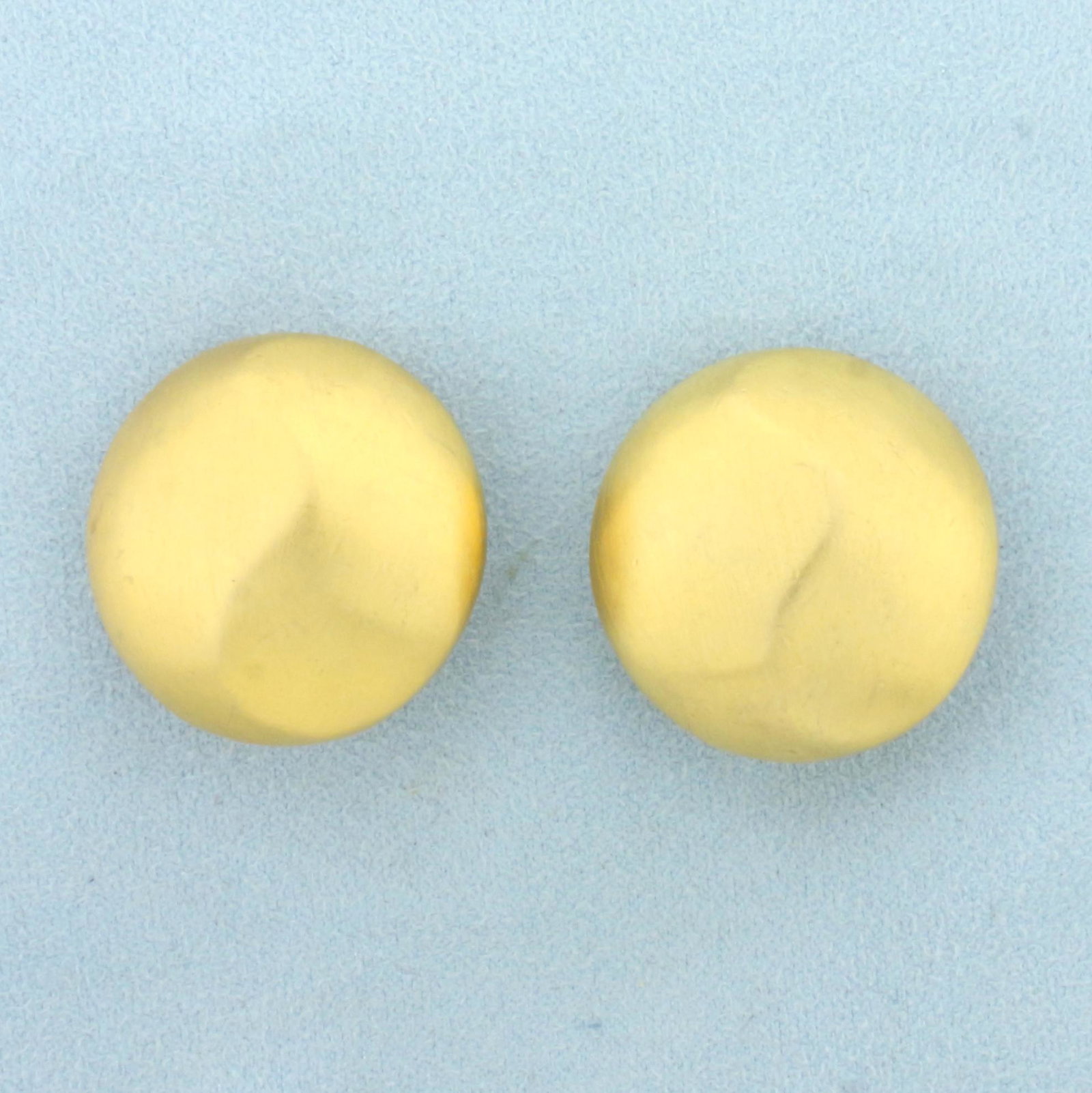 Vintage Designer Signed Givenchy Satin Finish Button Clip Earrings: Gold Plated. Rare design with brushed gold finish. Approx 1 1/8 inch diameter. Signed on back "GIVENCHY PARIS NEW YORK" Clip backs.