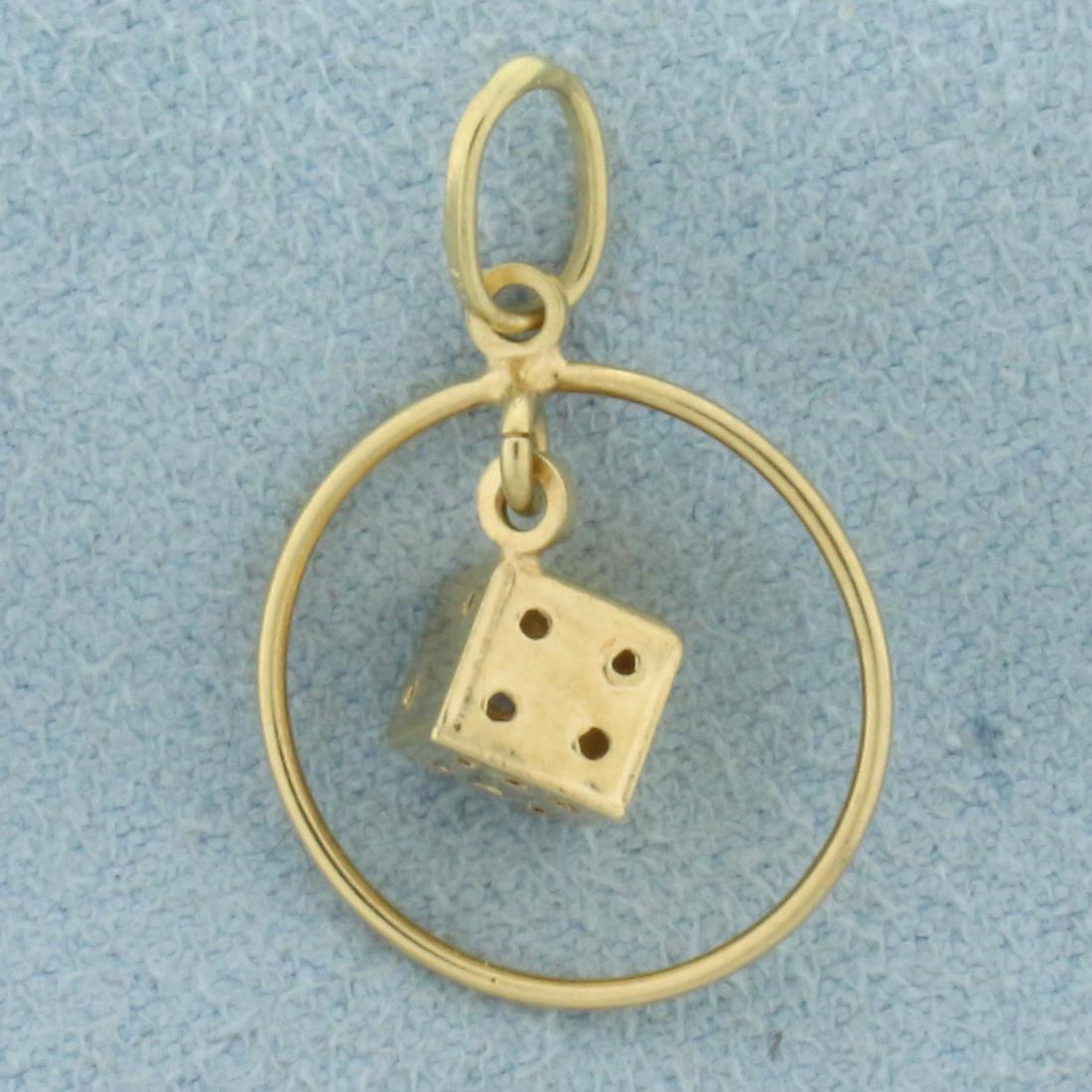 3D Lucky Dice Charm Or Pendant In 18k Yellow Gold: In 18k yellow gold. 3/4 inches long x 1/2 inches. Die dangles from hoop. 8g.