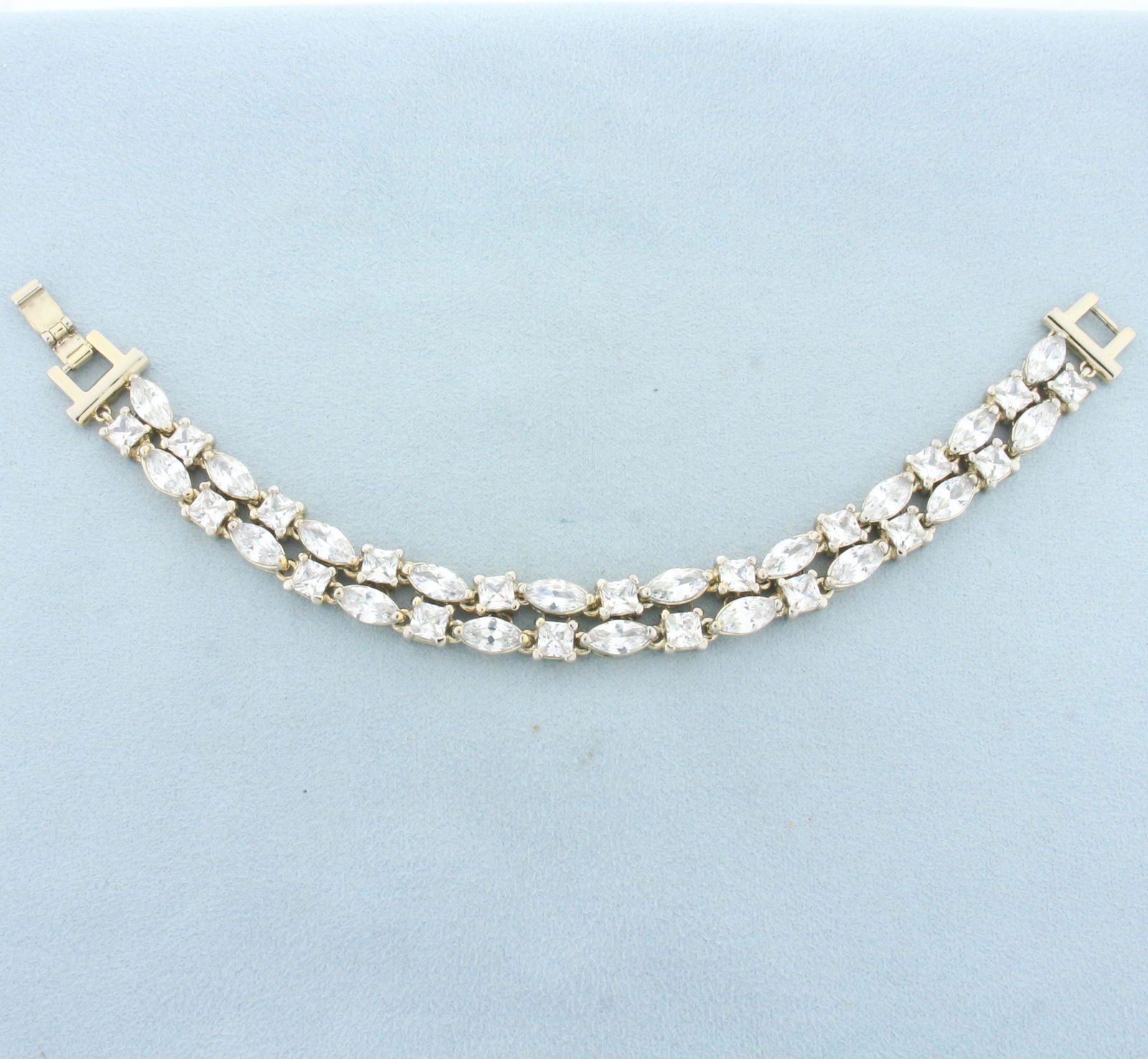 Clarion Pell Princess Grace Of Monaco Simulated Diamond Bracelet: Gold plated. Excellent condition (like new). #48372. 7 inches long, 3/8 inches wide. Includes extension links (1.5inches extra) with original box, papers, manufacture certificate, and box cover.