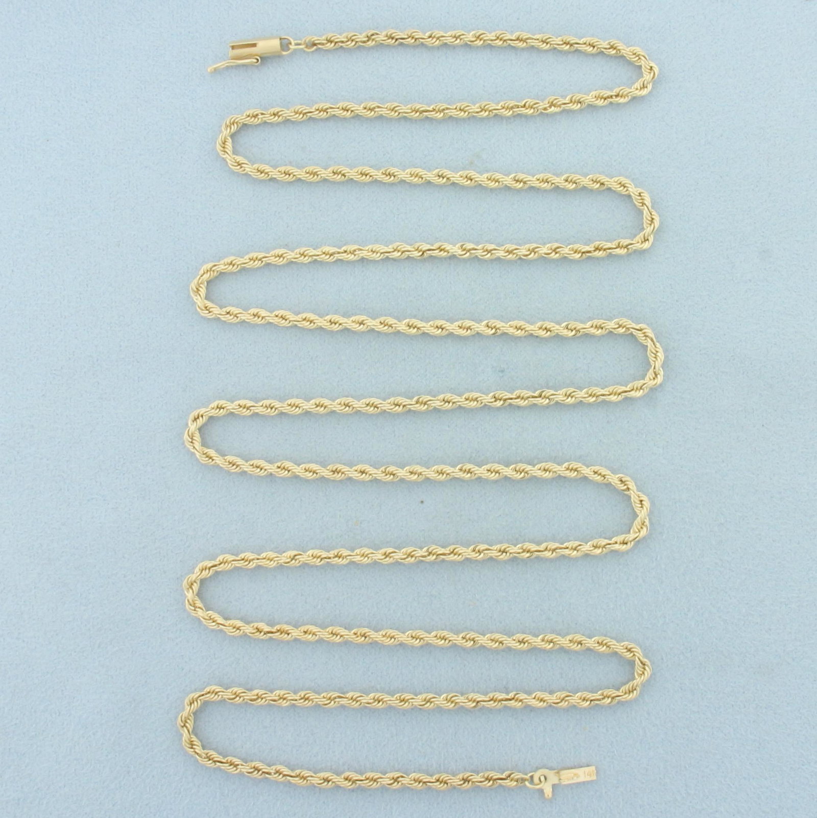31 Inch Rope Chain Necklace in 14k Yellow Gold: In 14k yellow gold. 31 inches long, 2.5mm wide. Barrel clasp with safety latch. 17.1g.