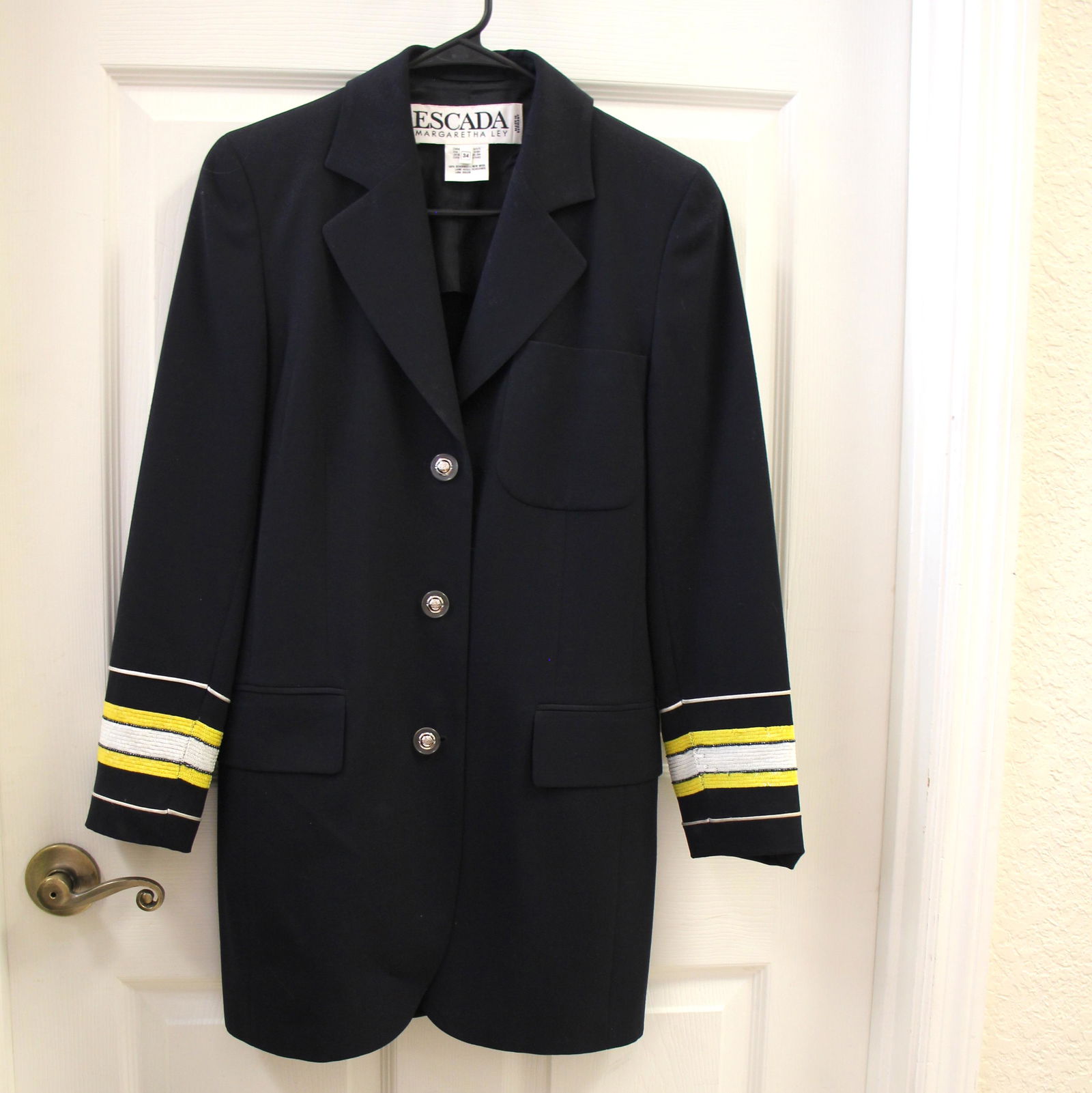 Escada Margaretha Ley Navy Sequin Trim Captain Sailor Sportcoat Blazer: Size 34. Vintage Escada Margaretha Ley. Made in Germany. 100% wool with rayon lining. Sequin nautical detailing with logo buttons. Good vintage condition.