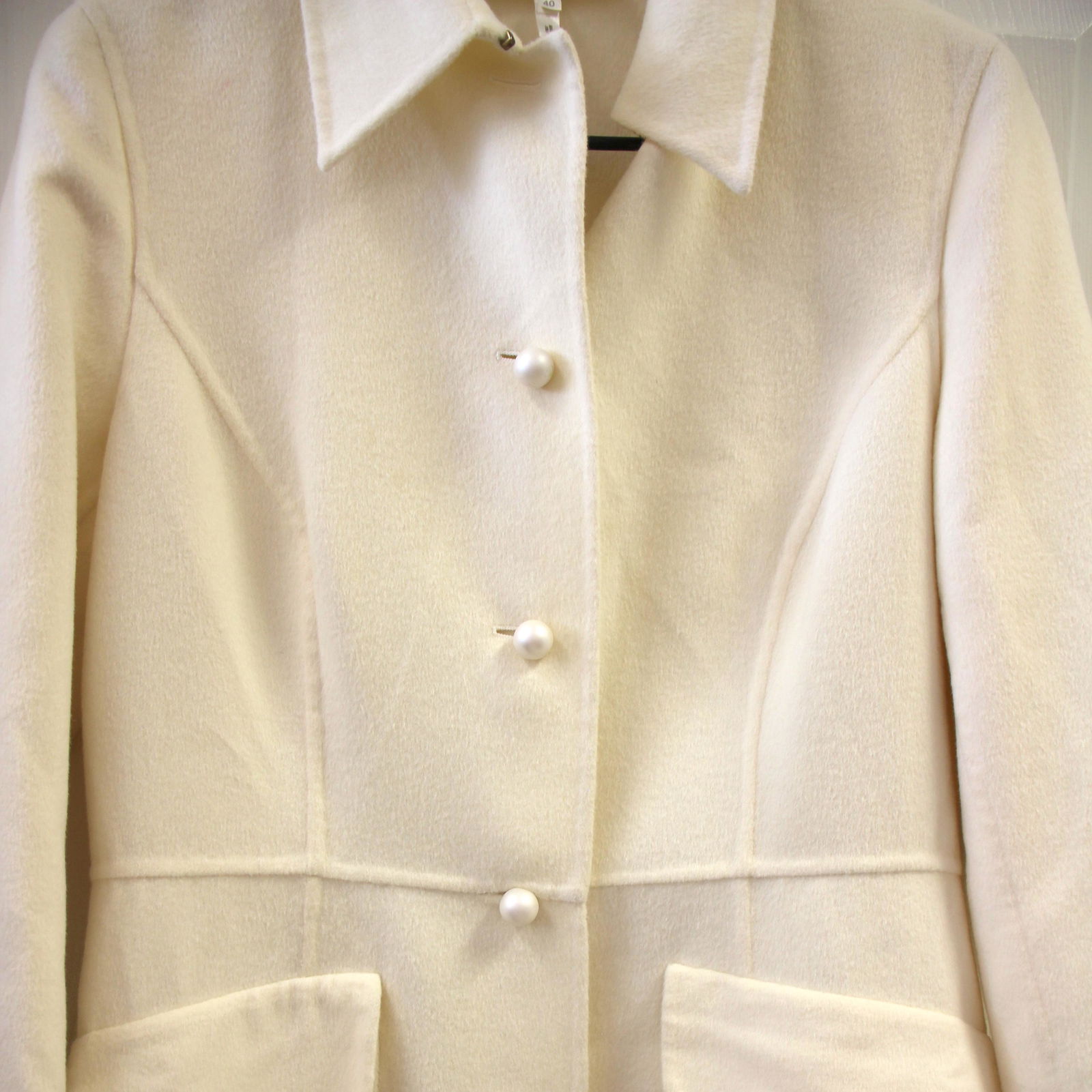 Escada Rabbit Wool Dressy Pearl Button Coat: Size 40. Vintage Escada. Made in Italy. 45% Rabbit, 45% wool, 10% cashgora. Lined armholes. Oversized pearl buttons. Extra button still attached inside. Great vintage condition with minor imperfection