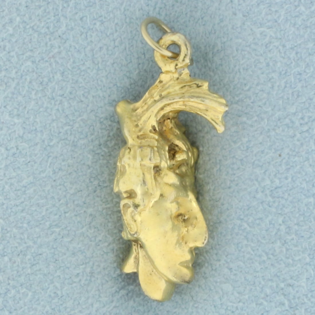 3D Mayan King Pakal Vintage Charm in 14k Yellow Gold: In 14k yellow gold. 1 inch long (including jump ring) x 3/8 inches wide. 6.0g.