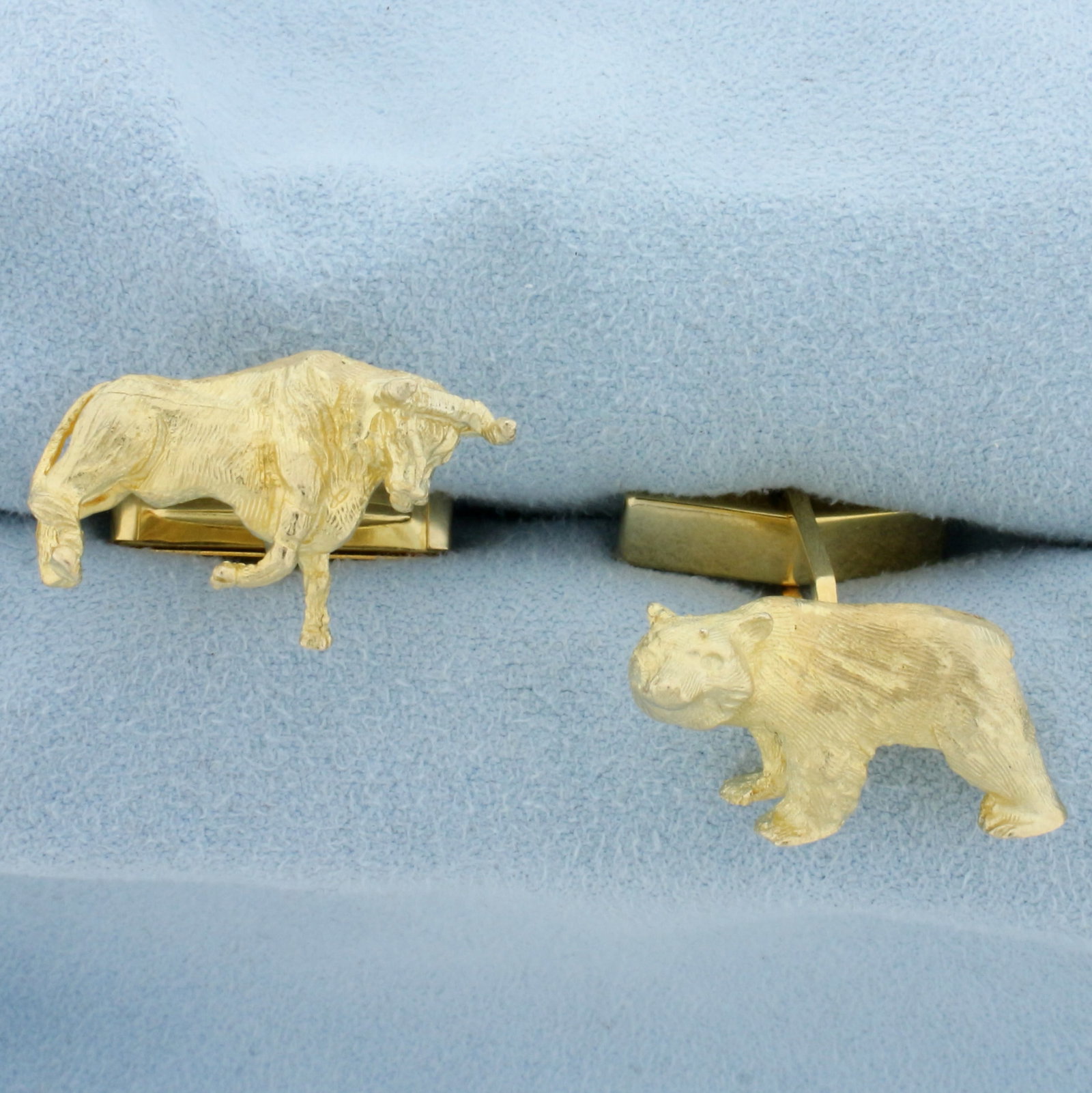 Lindsay Wall Street Bull And Bear Cufflinks in 14k Yellow Gold: In 14k yellow gold. Bull and Bear are 1 inch long. 21.7g.