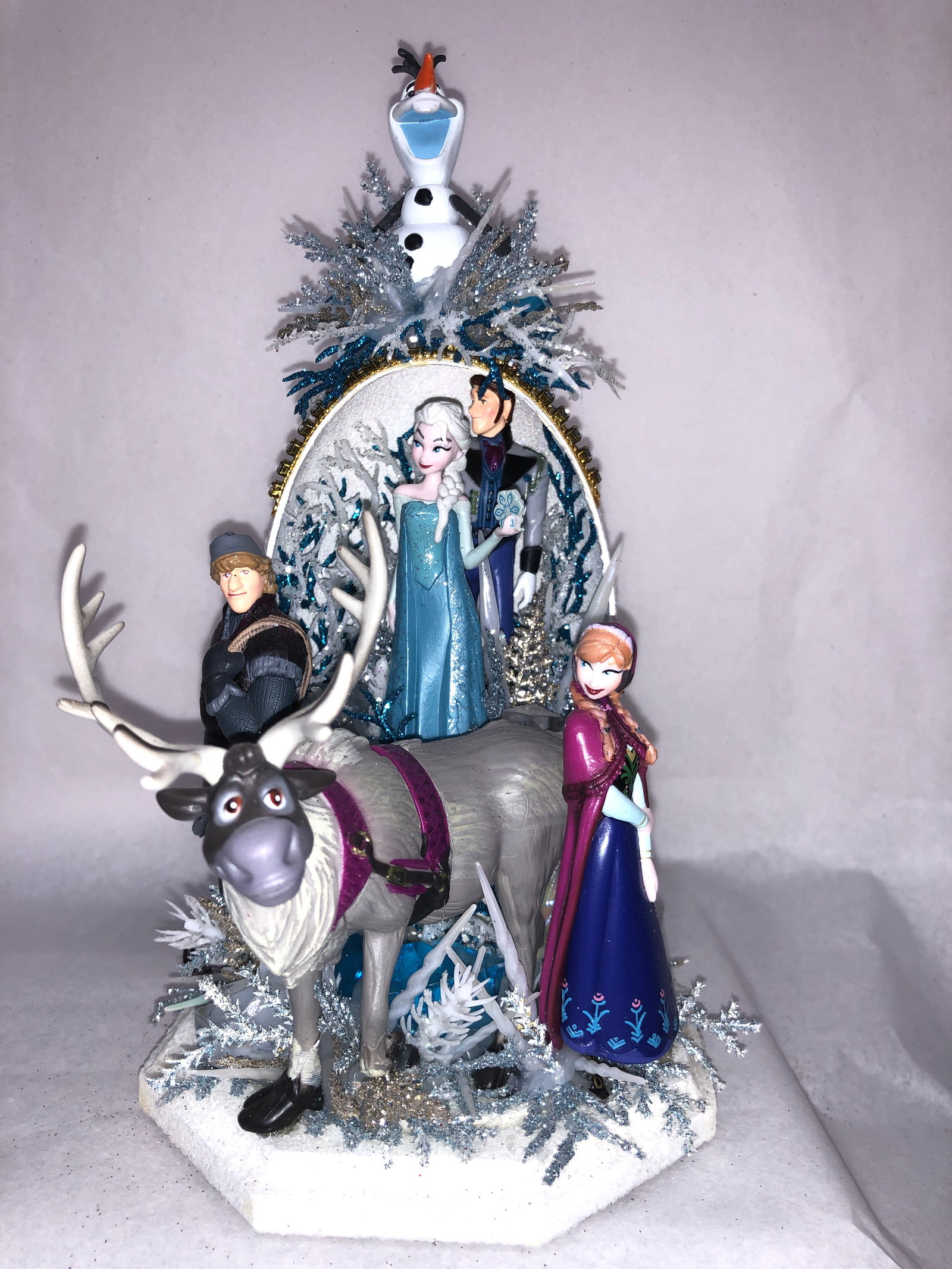 Disney Frozen Hand Created Emu Egg Sculpture: Exquisite hand decorated collectible, created from a real emu egg. The egg is cleaned, hand carved and painted with Luminere metallic paints and glittered to compliment the theme of the Disney charact