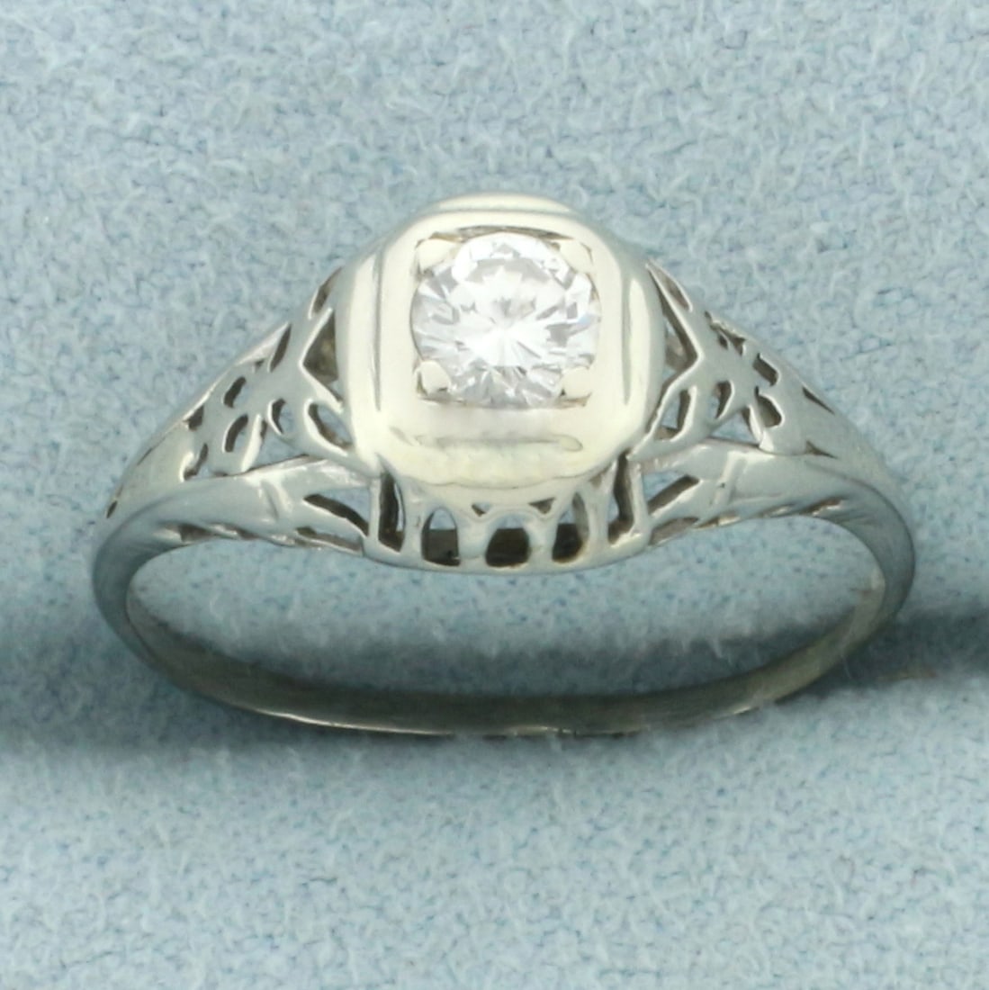 Vintage Diamond Filigree Solitaire Engagement Ring in 14k White Gold: In 14k white gold. Contains one high quality 1/4ct round brilliant diamond, VS clarity/G color. Size: 6.25. 1.7g.