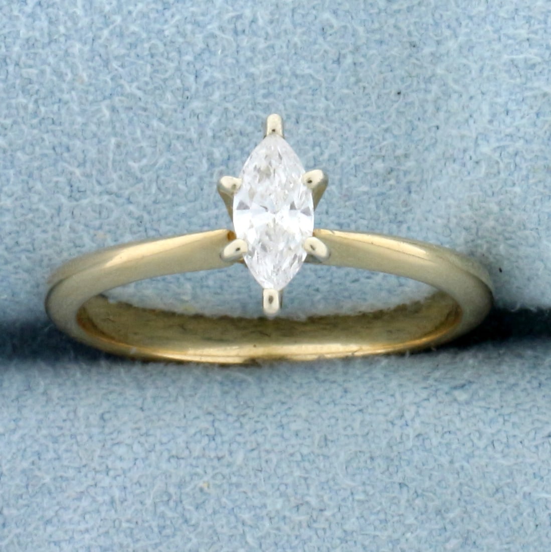 1/3ct Marquise Diamond Solitaire Engagement Ring in 14K Yellow and White Gold: 14K Yellow Gold ring, head in 14k White Gold. Contains a high quality 1/3ct marquise Diamond, SI clarity/G color, great cut for lots of sparkle. Size 6 1/4. 2.3g