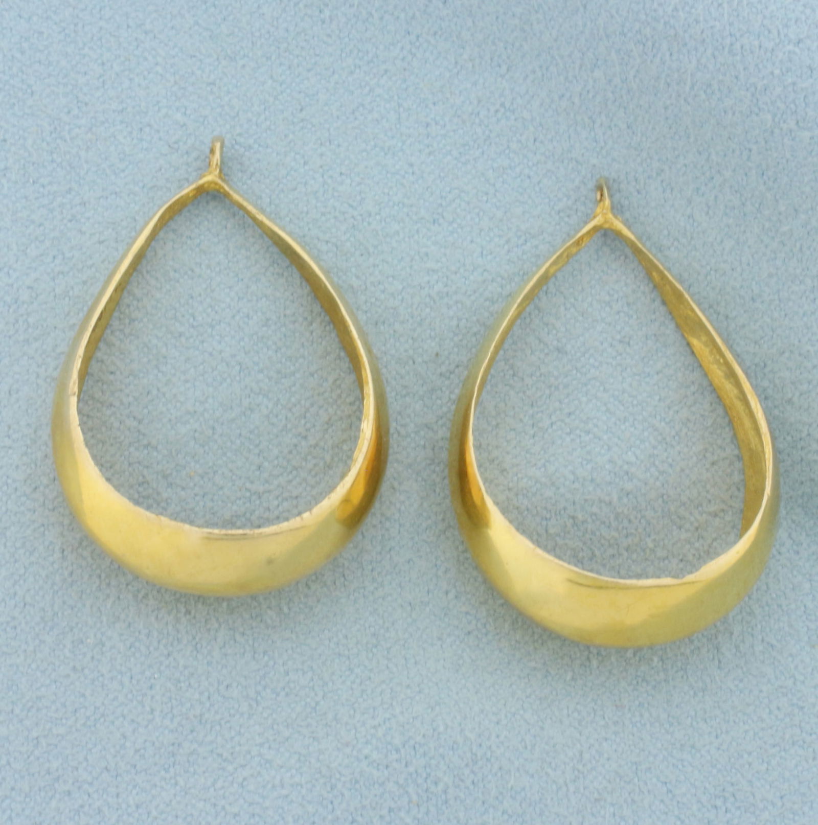 Tear Drop Hoop Stud Earring Enhancers in 10k Yellow Gold: In 10k yellow gold. 1 3/8 inches long x 7/8 inch diameter, 1.9mm 8.4mm width. 6.8g.