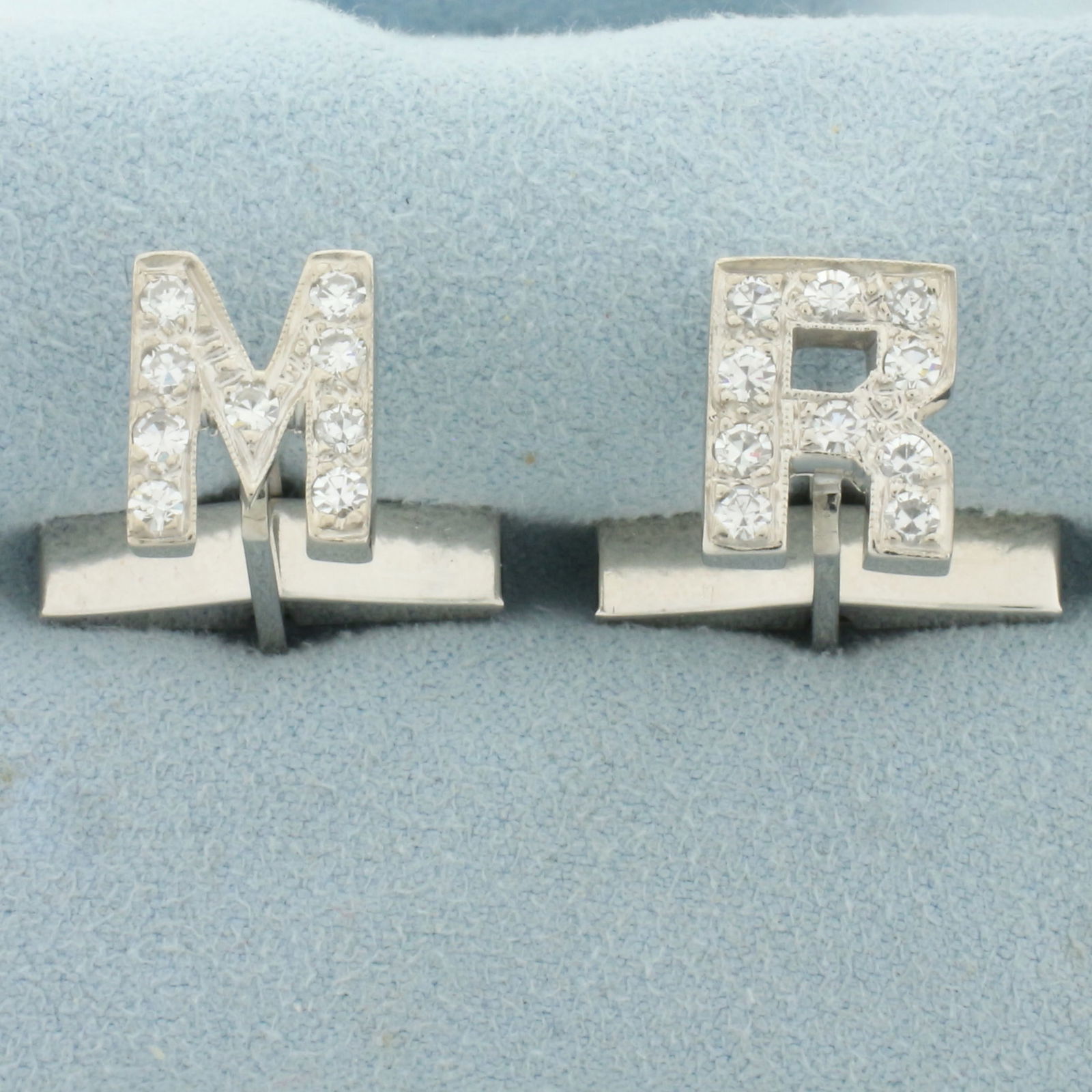 Diamond Initial M and R Letter Cufflinks in 14k White Gold: In 14k white gold. Contains nineteen high quality diamonds, 3/4ct TW, VS clarity/G color. 1/2inches high x 1/4 inch wide. 6.5g.