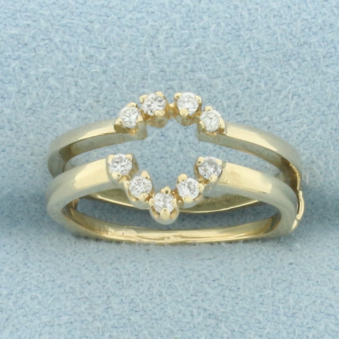 Diamond Ring Jacket for Pear Diamond in 14k Yellow Gold: 14k Yellow Gold. Contains ten high quality diamonds, 1/8ct TW, SI clarity/I color. Would fit a 1/2ct pear solitaire engagement ring. Size6 1/2. 3.3g.