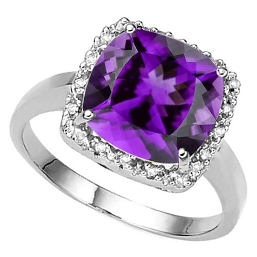 3.5CTW Cushion Cut Amethyst and Diamond Halo Ring in Sterling Silver: Platinum over sterling silver. Contains one cushion cut amethyst gemstone, 3.5cts, accented with 2 genuine diamonds, .01ctw. Size 6. 3.6g